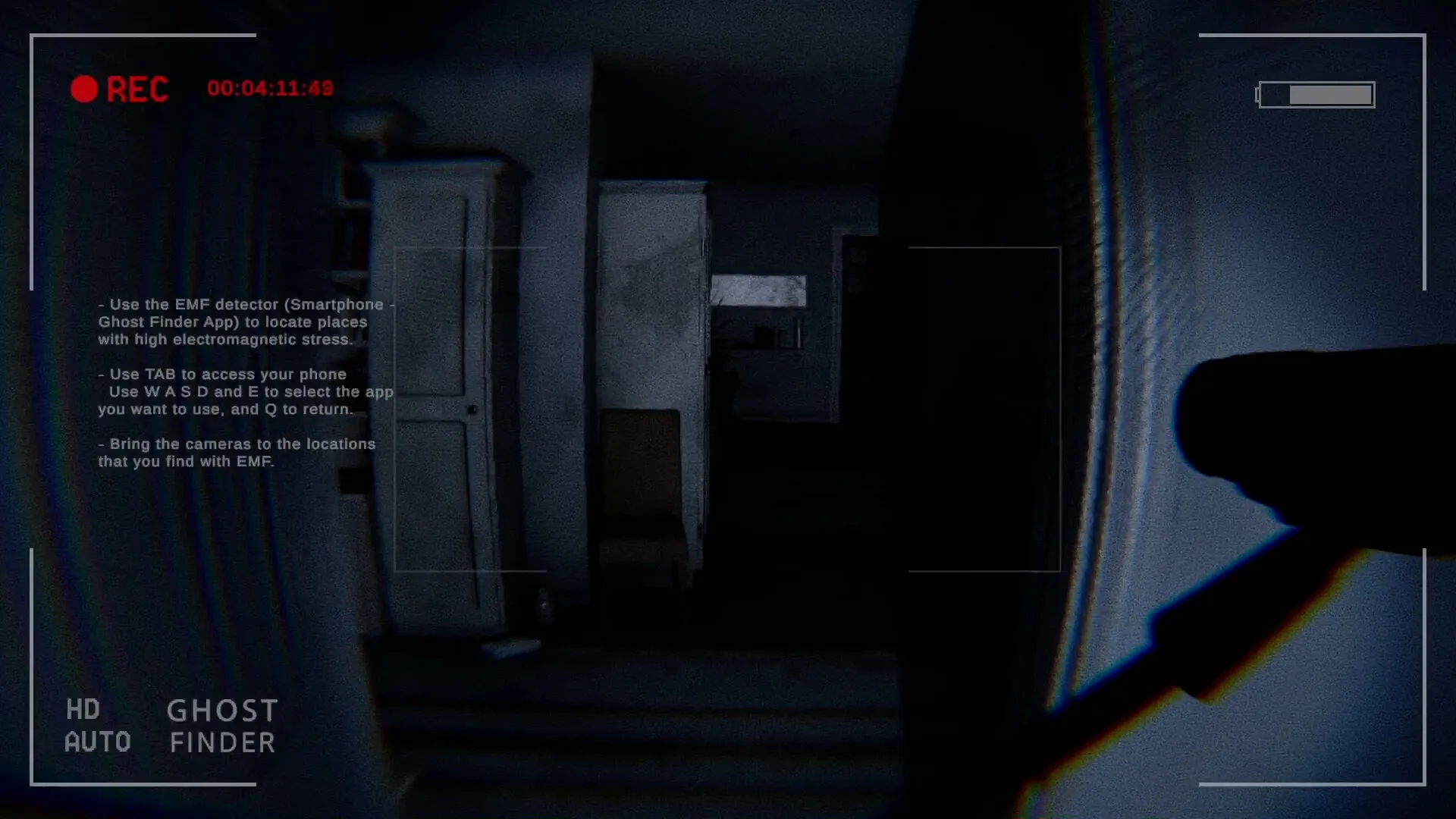 Ghost Frequency: EMF detector instructions overlay in a dimly lit hallway with recording UI elements