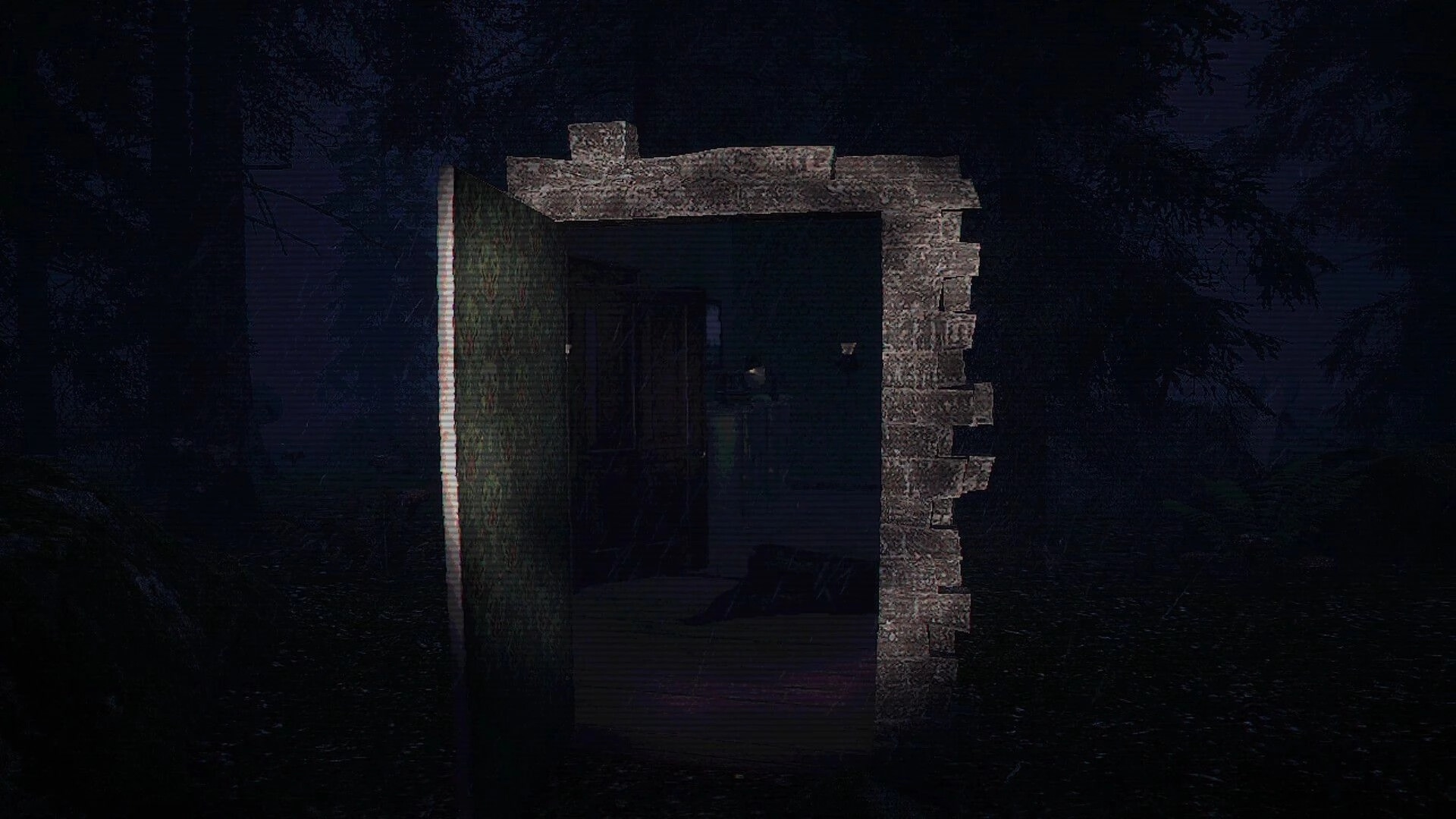 Ghost Scout: Grainy night view of a small stone ruin with a doorway and darkness inside, in woods.