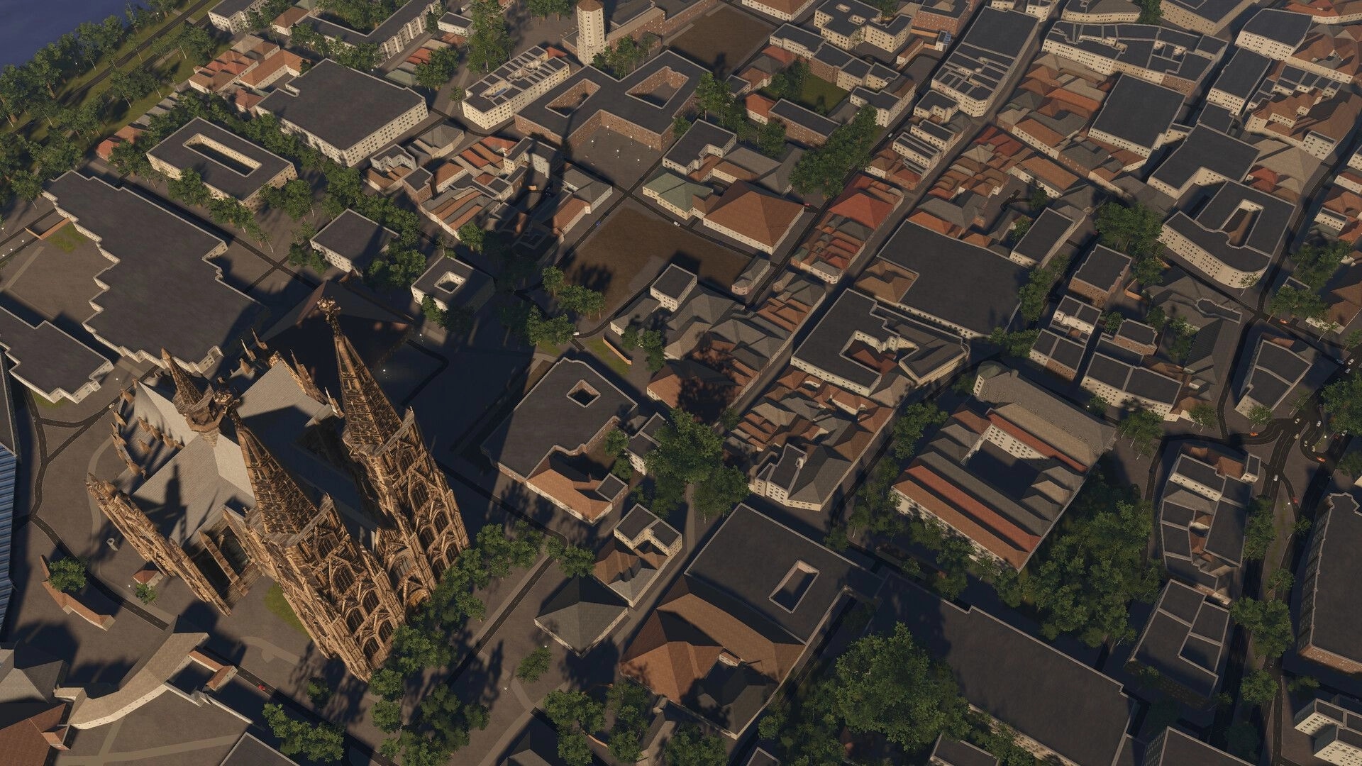 Global Rescue: Aerial view of a detailed cityscape with a prominent cathedral and surrounding buildings