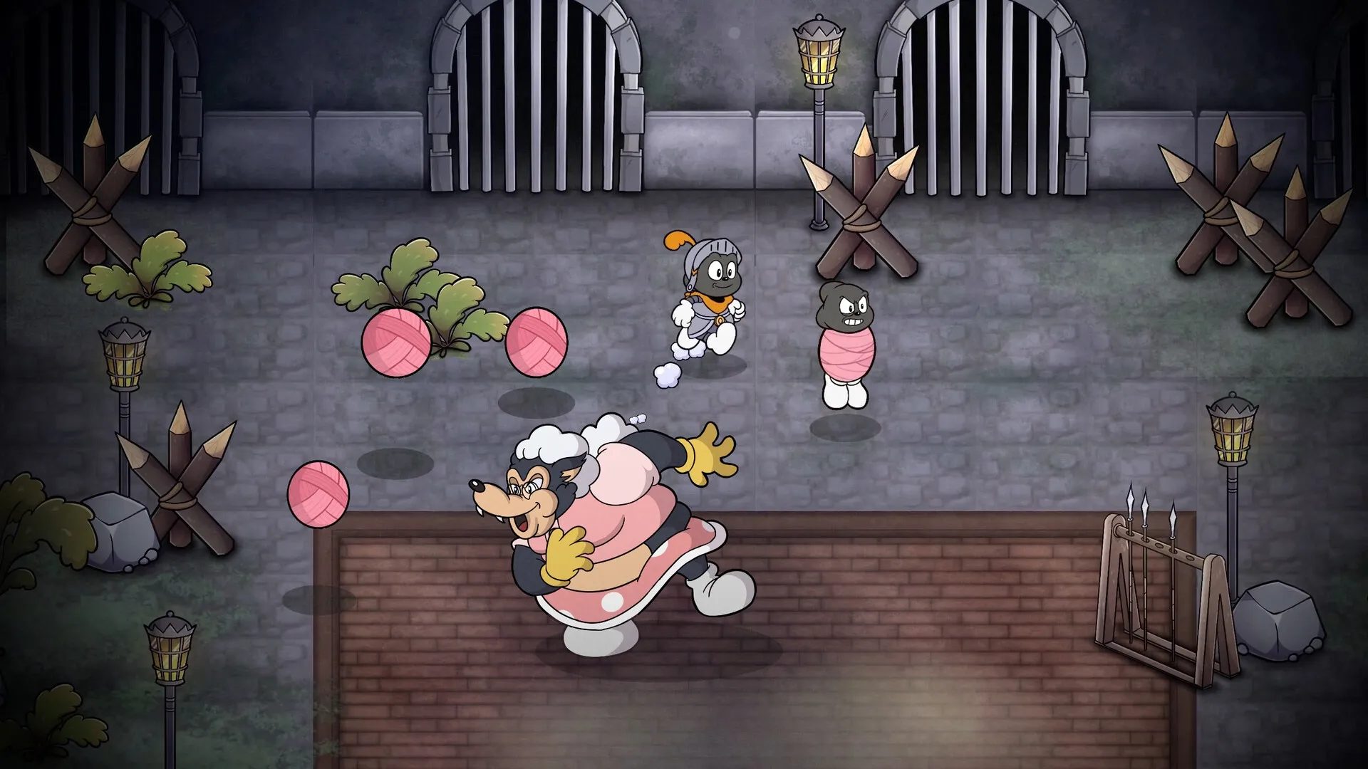 Gombo: Chased by enemy in fortress courtyard with yarn balls and wooden barricades scattered around