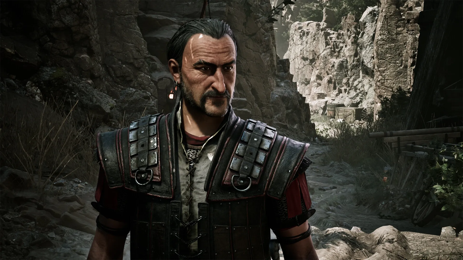Gothic 1 Remake: Armored character stands in rocky valley setting, surrounded by rugged terrain.