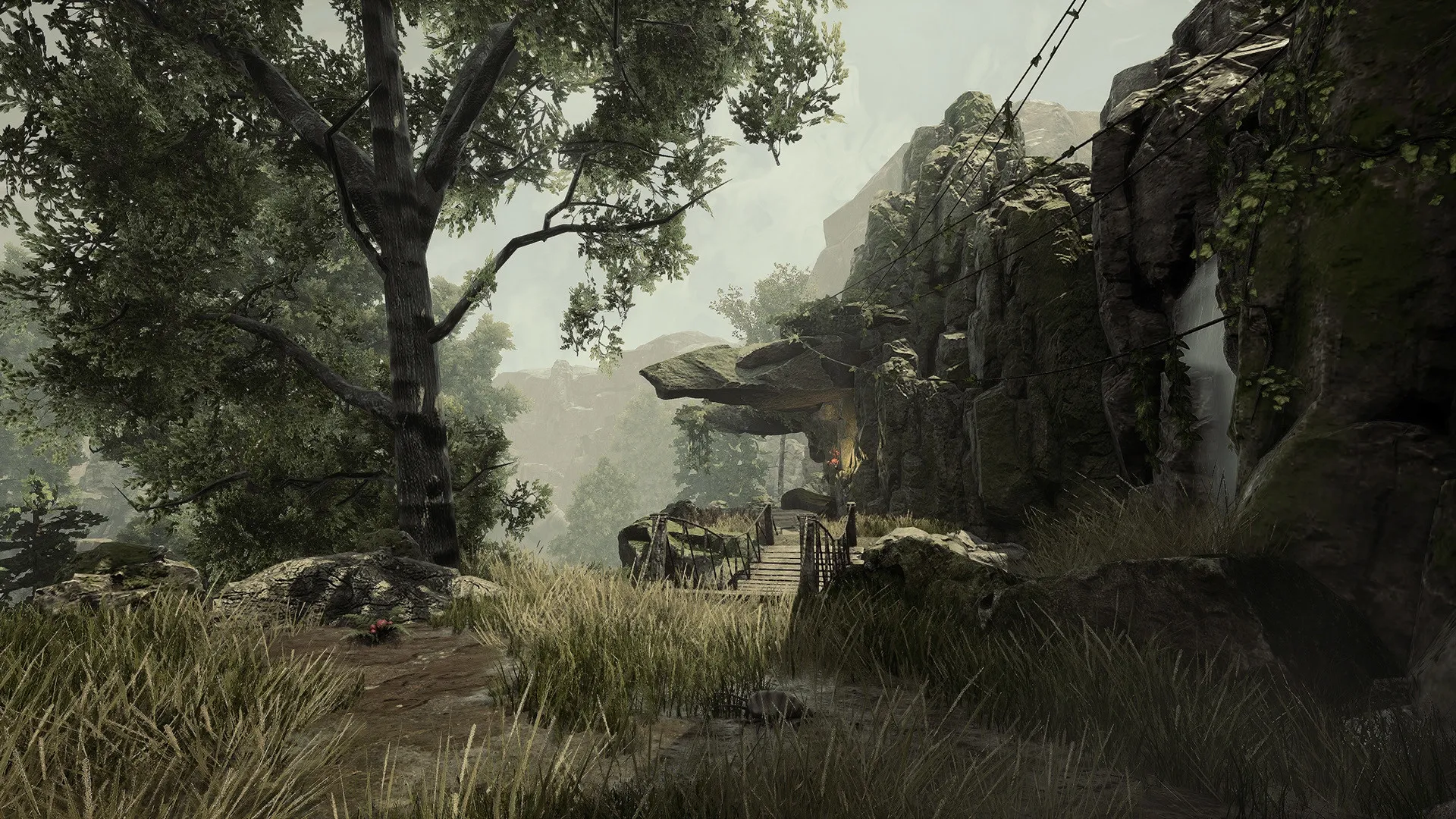 Gothic 1 Remake: Scenic view of lush forest path leading to a rocky bridge in the Valley of the Mines