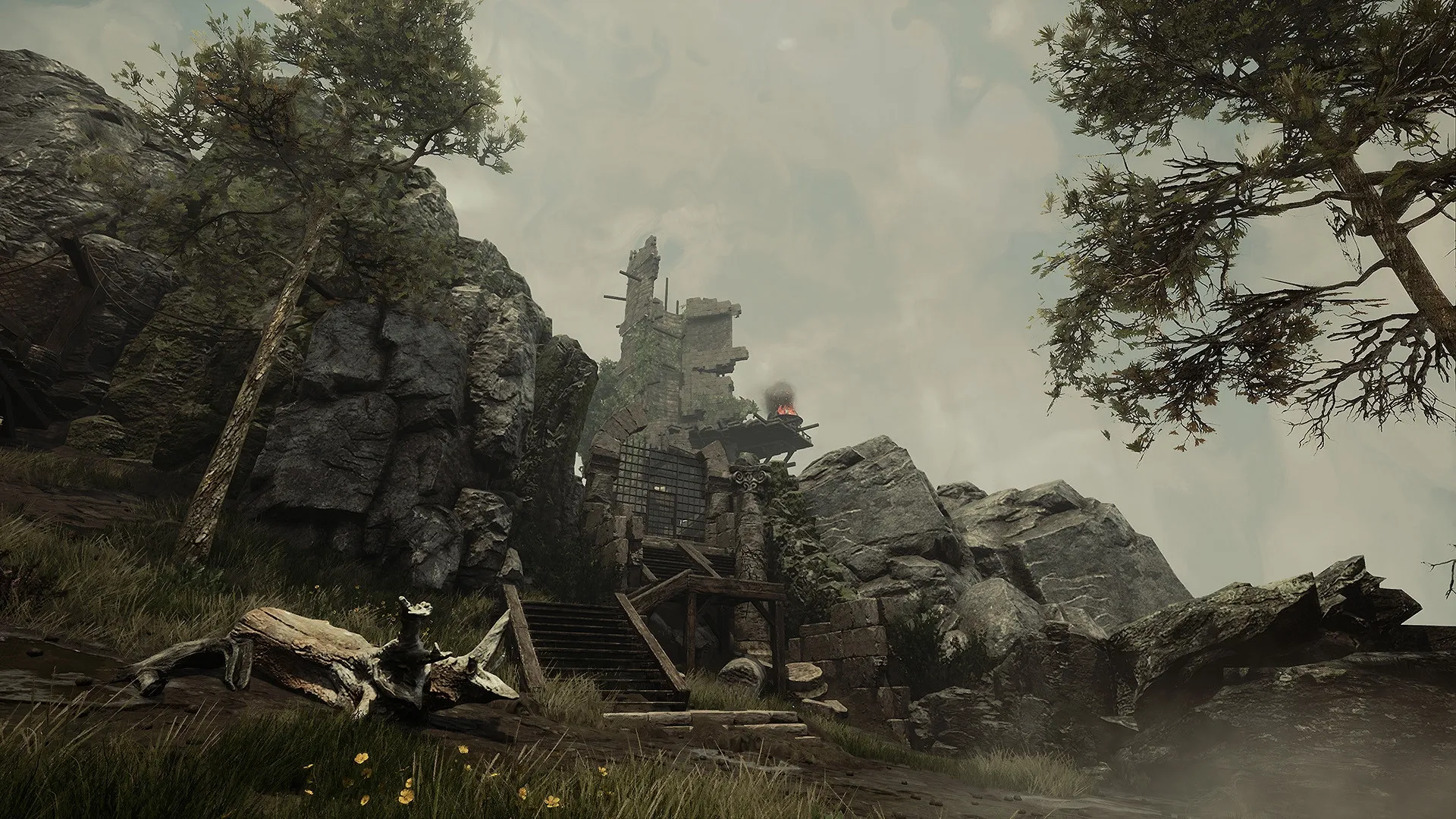 Gothic 1 Remake: Ruined stone fortress with burning torch amidst rocky landscape and towering trees