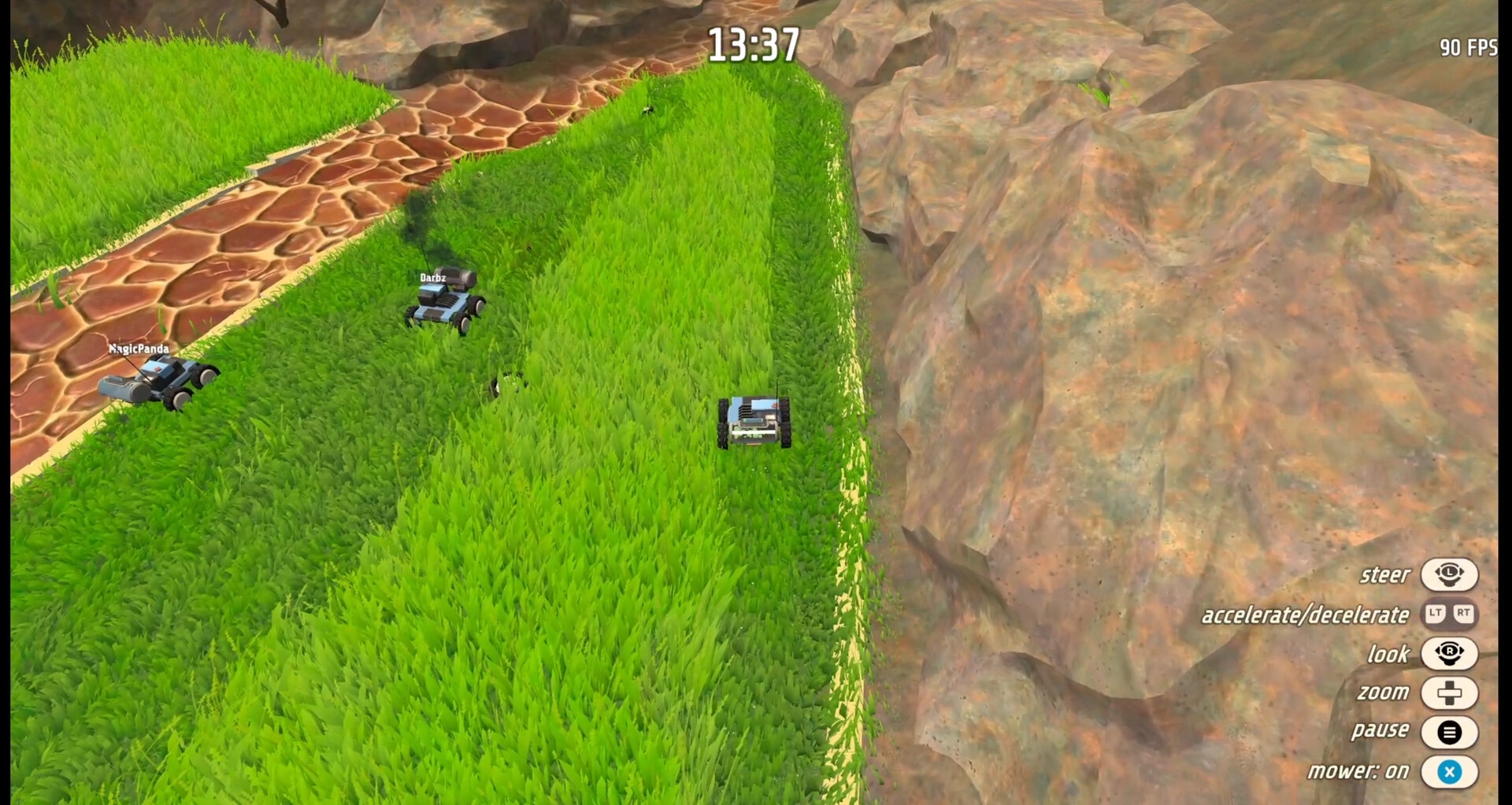 Grass: Two player mowers cut tall grass beside a stone path and cliff, timer 13:37 UI.