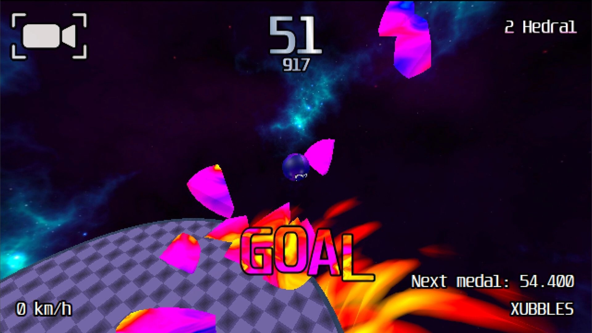 Gravosphere: Marble reaches goal surrounded by colorful shards in a cosmic space environment