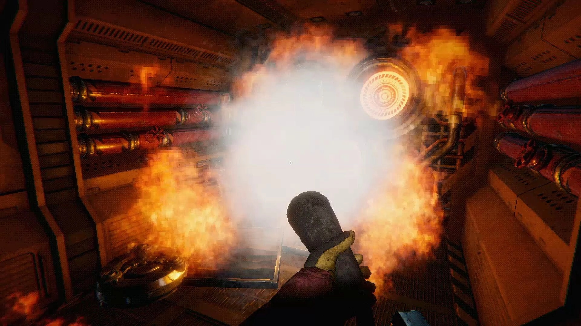 GRINDWORM: First-person view aiming a flamethrower at blazing machinery in a cramped metal tunnel.