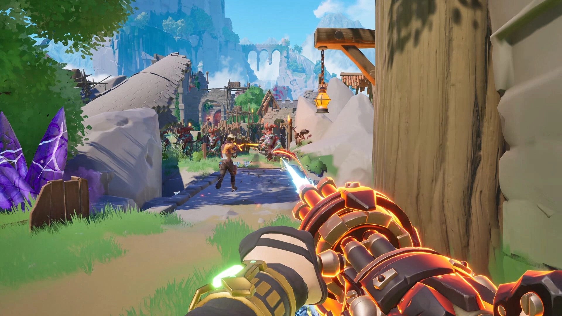 Guns and Dragons: First-person gunfire at horned enemies on a stone path in a ruined village gate.