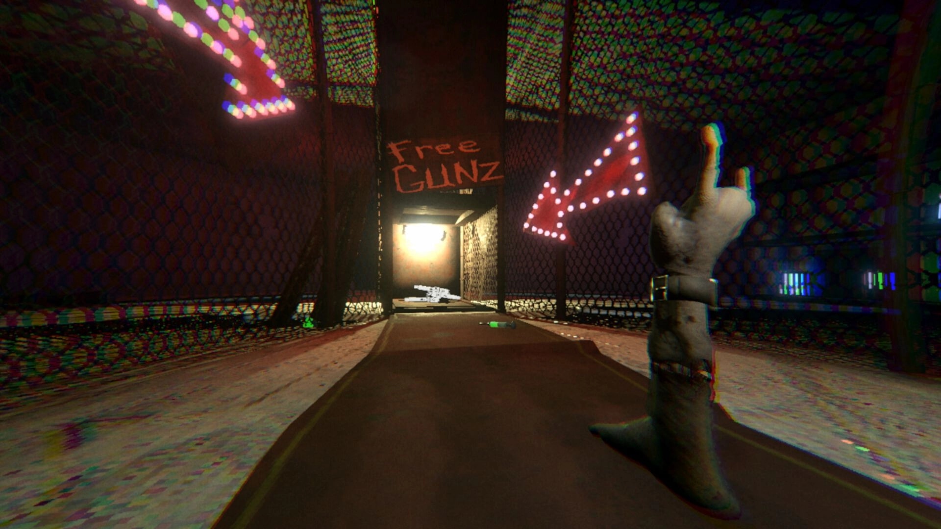 HandFoot: First-person hand points toward Free Gunz doorway in neon-lit chain-link corridor.