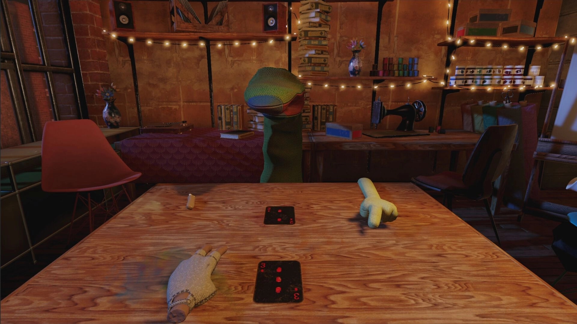 Handsum: Sock puppet opponent and player hands with cards on wooden table in dimly lit cozy room