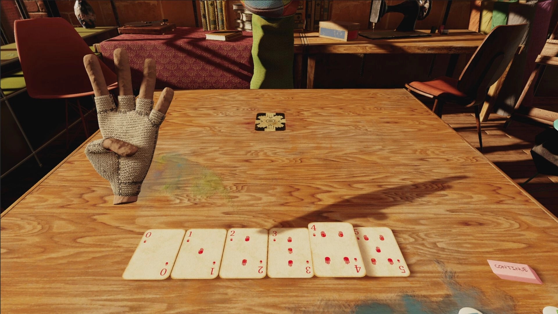 Handsum: Bandaged hand above cards numbered 0-5 on wooden table in cozy, book-filled room.