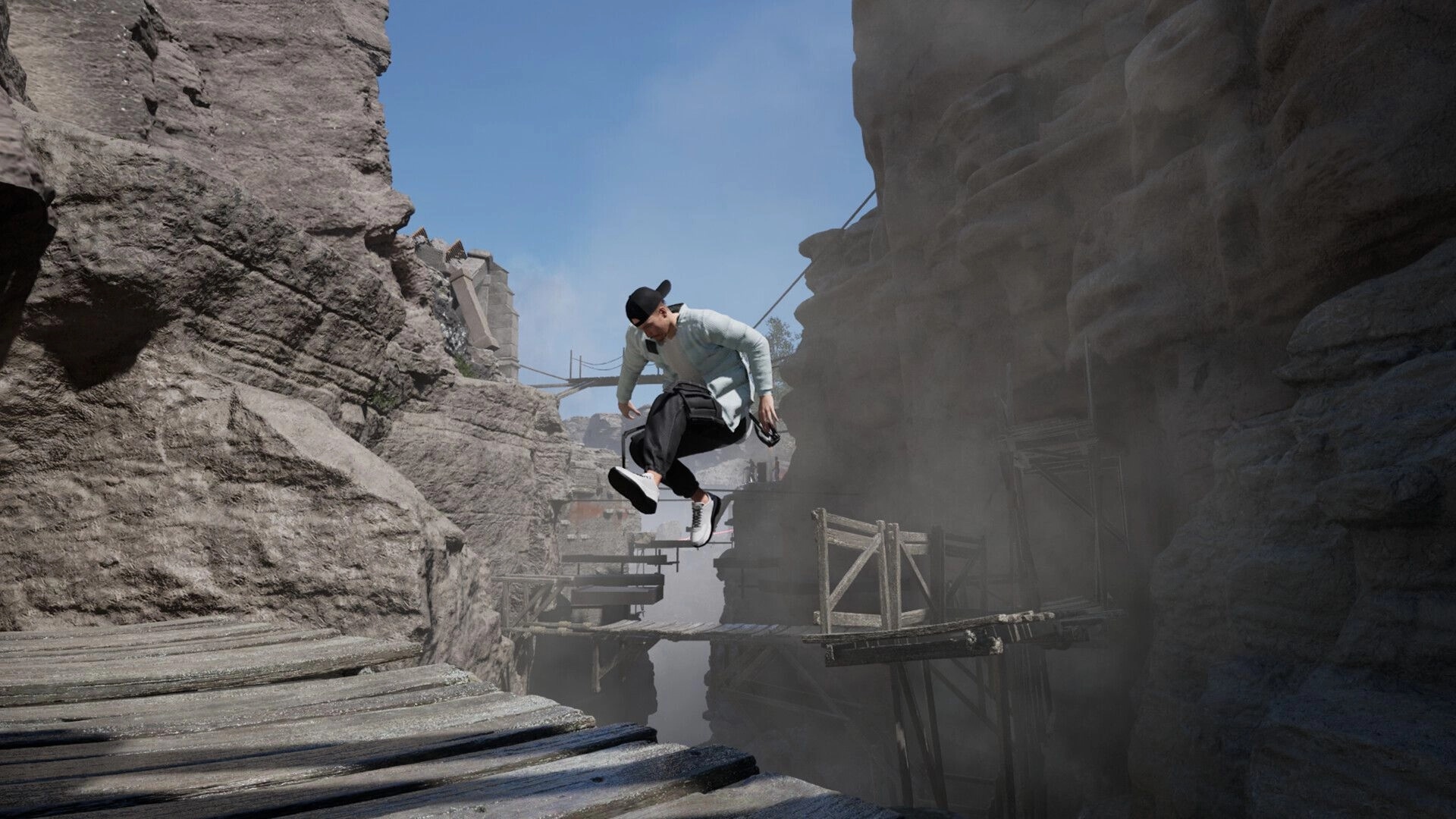 Harder Parkour: Character leaping over a broken bridge in a rocky canyon environment with clear skies