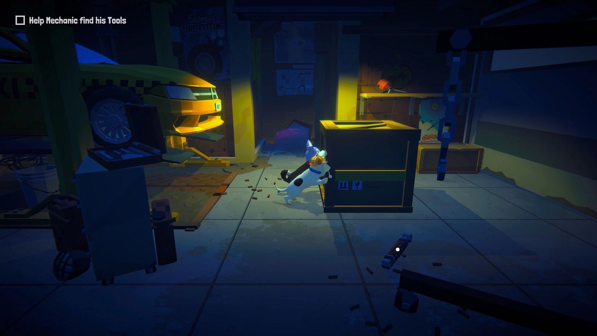 Haunted Paws: Puppy pushes a box in a dimly lit garage with task to help mechanic find his tools.