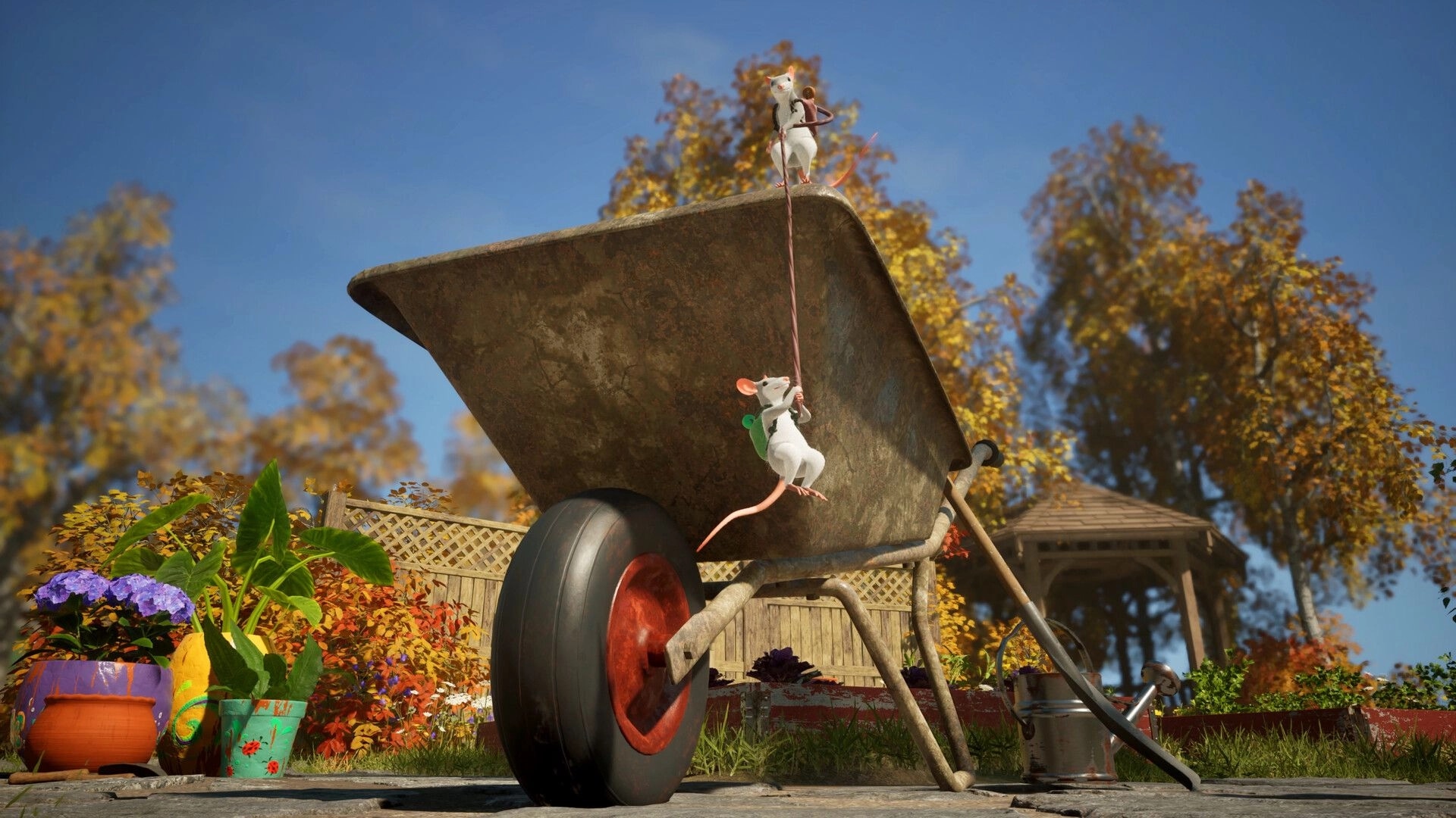 Hela: Two mice climb a rope on a tipped wheelbarrow in a sunny backyard garden with flowers.