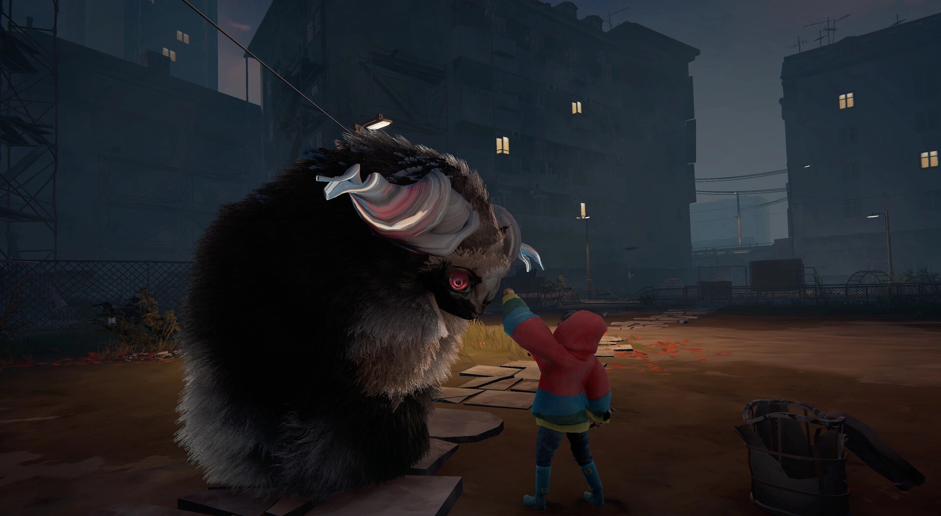 Herdling: Child in red hoodie reaching up to giant creature in dimly lit urban courtyard at night