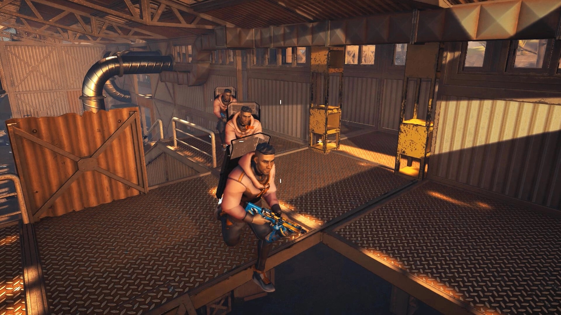 Hiding: Three characters crouching with weapons on a metal platform in an industrial warehouse.