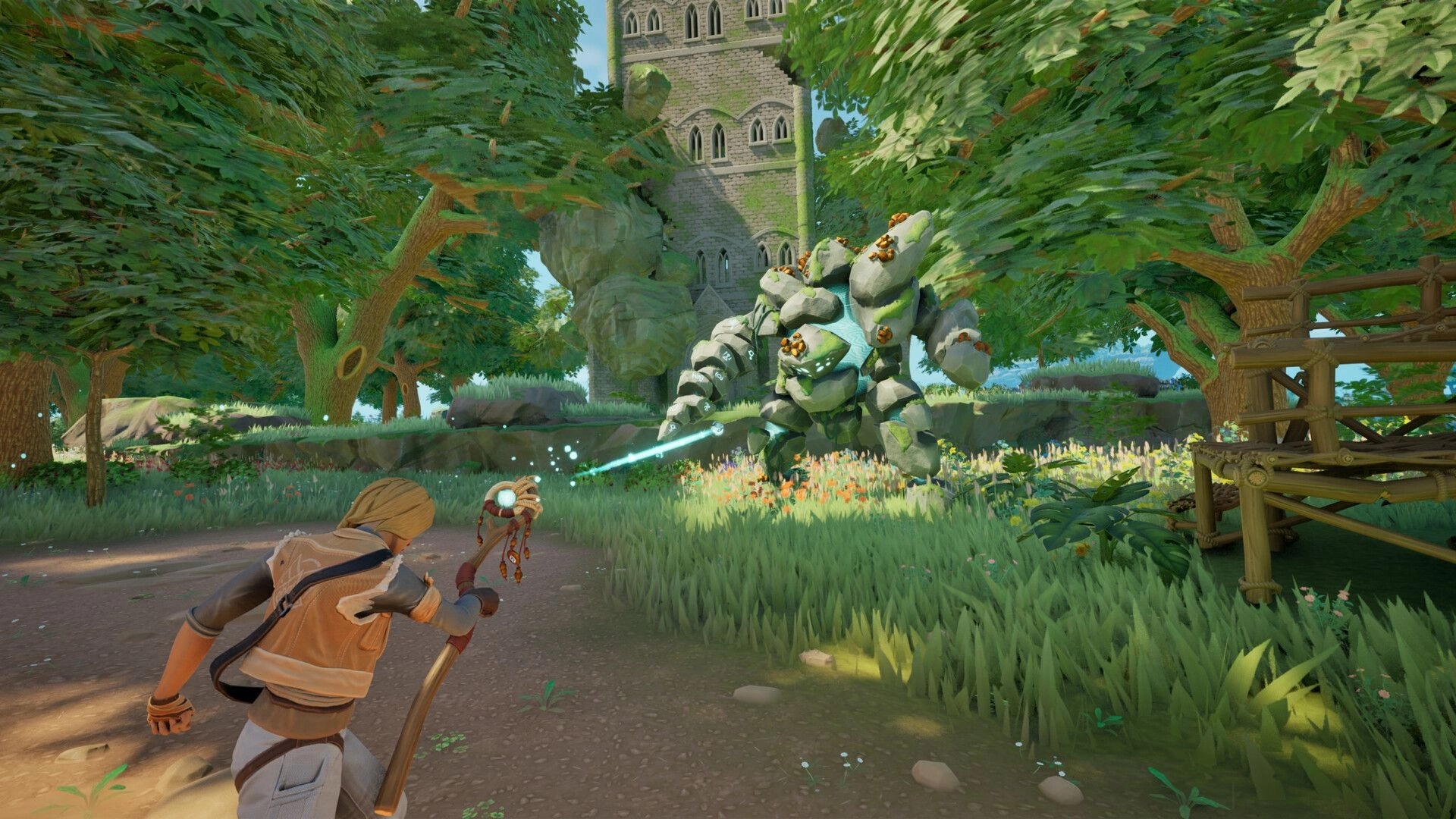 Highreach: Player aims staff at a stone golem in forest clearing near ruined tower and scaffold.
