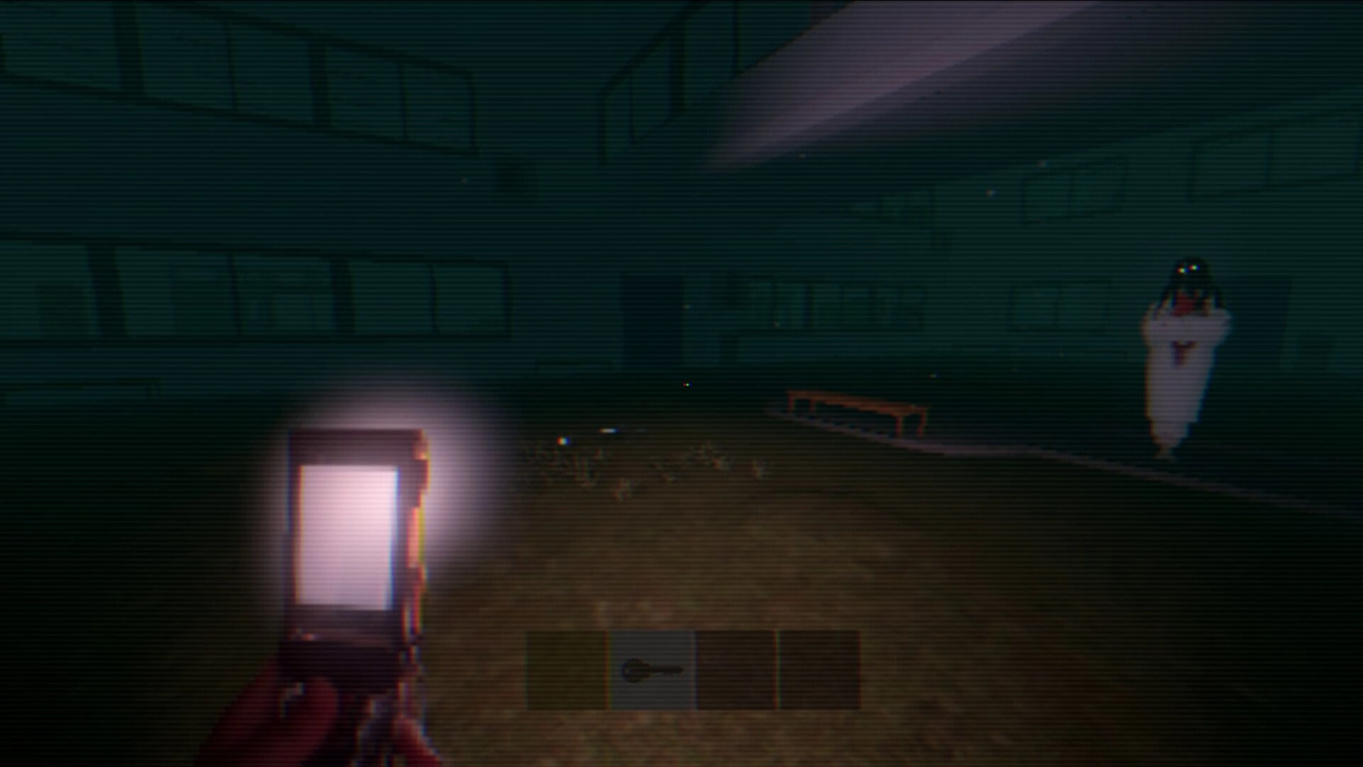 Hitobashira [人柱]: Phone flashlight aimed at a ghostly girl in a dark school gym, key in hotbar.