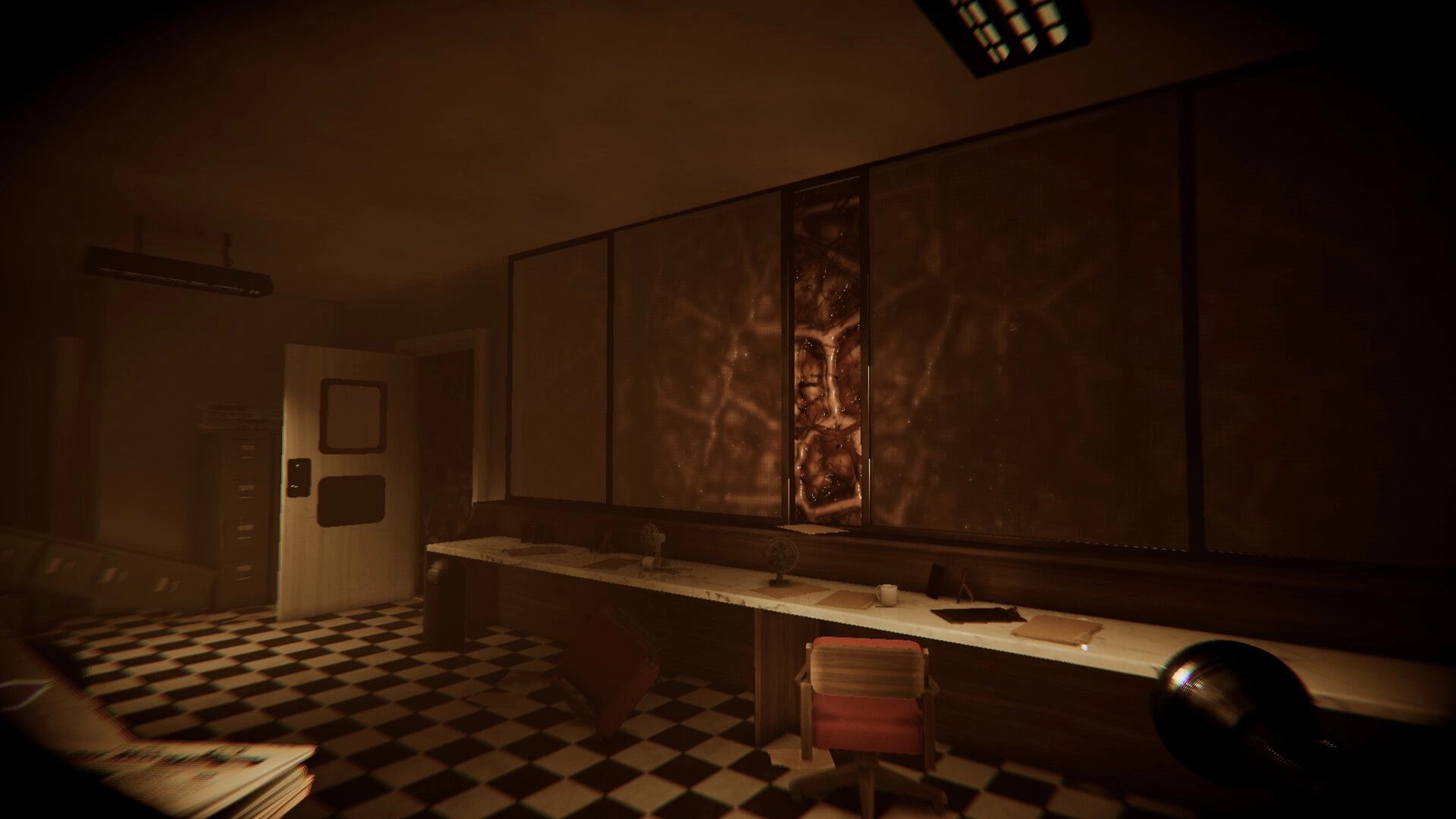 Hollow Flesh: Flashlight view of a grimy office with checkered floor and fleshy growth behind glass wall.
