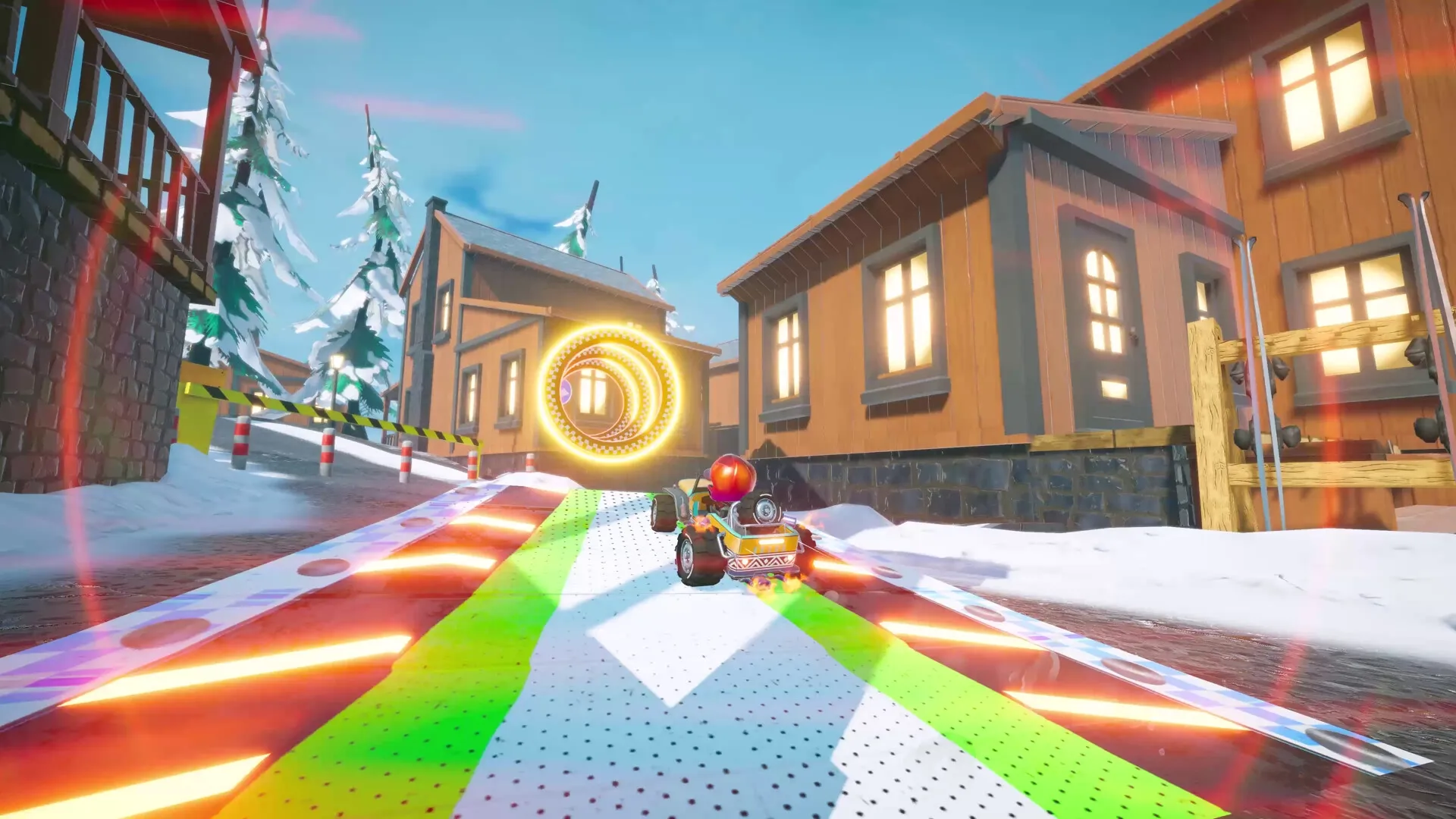 Hot Rod Mayhem: Racing through snowy village track with vibrant ramps and glowing hoops.