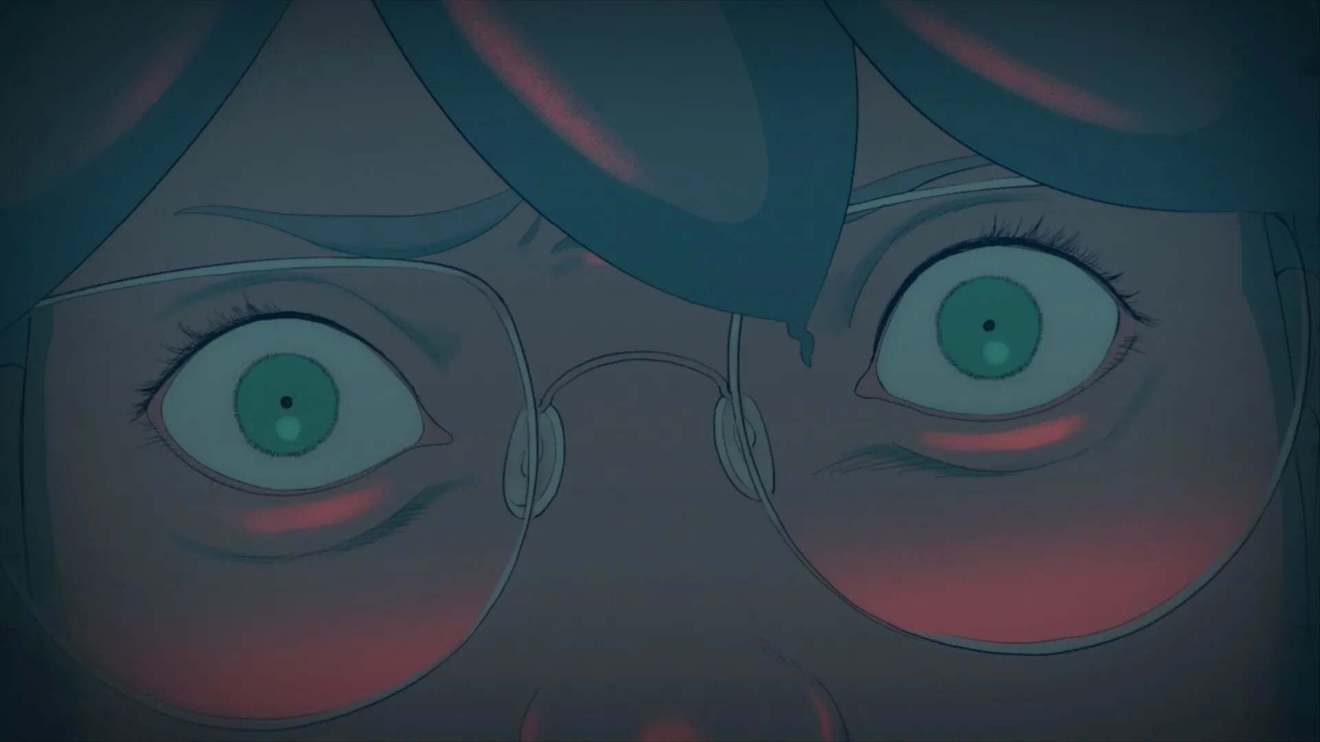 HOTEL BARCELONA: Close-up of a character's wide eyes filled with shock and fear in a dimly lit setting.