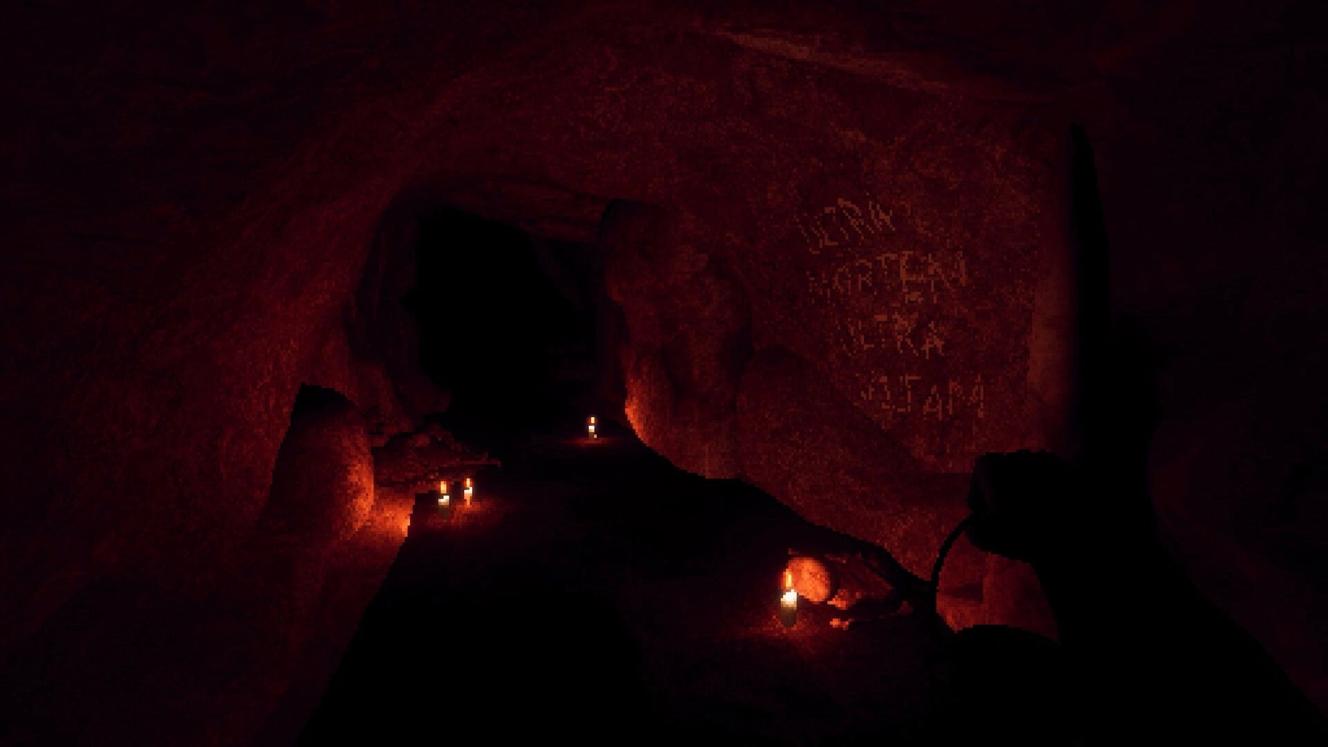 House of Saturn: Shadowy figure holds a lantern in a red cave lit by candles and wall writing.