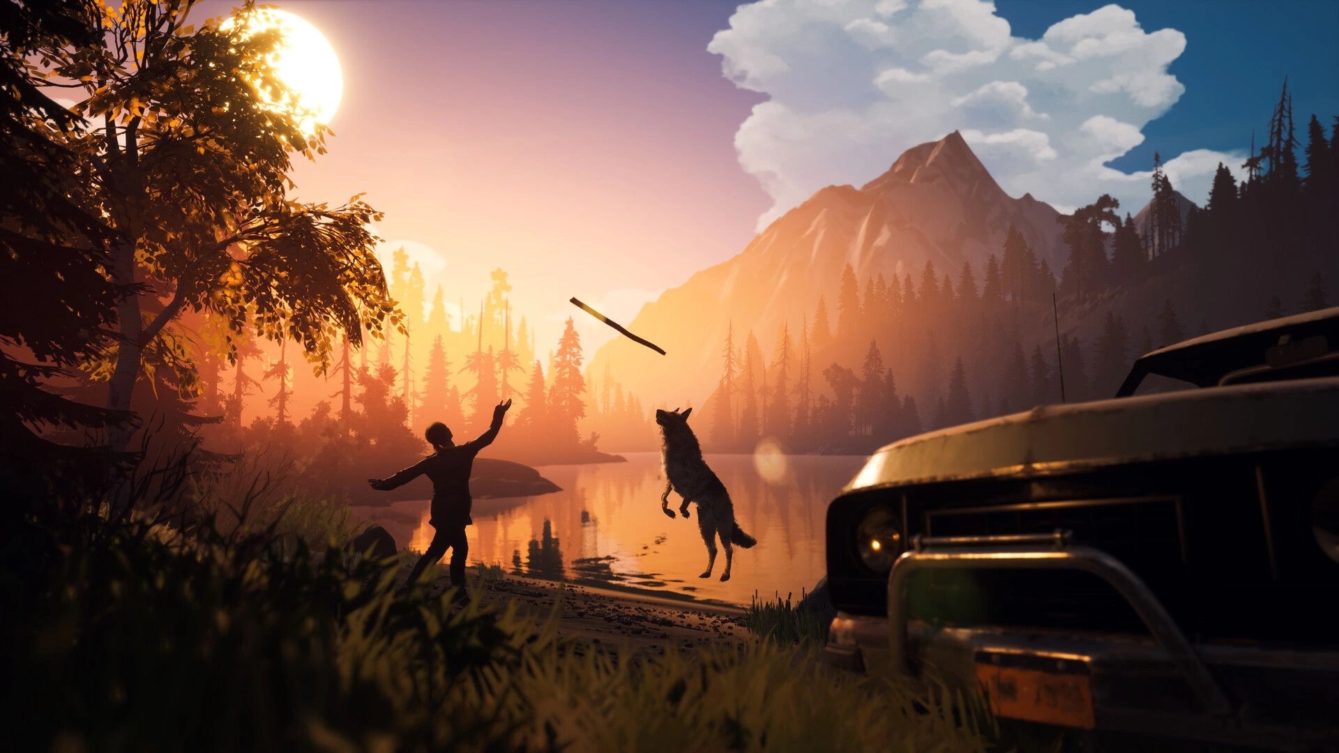 Hubert: Dog leaps for stick by lake at sunset, with silhouette of person and car in rugged wilderness.