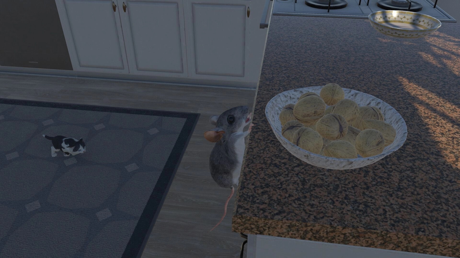 I Am Mouse: Mouse clings to kitchen counter edge near bowl of walnuts as a cat prowls on rug.