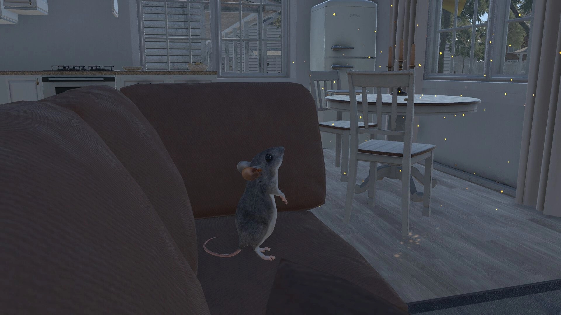 I Am Mouse: Mouse standing on a couch in a bright kitchen-dining room with glowing particle specks.