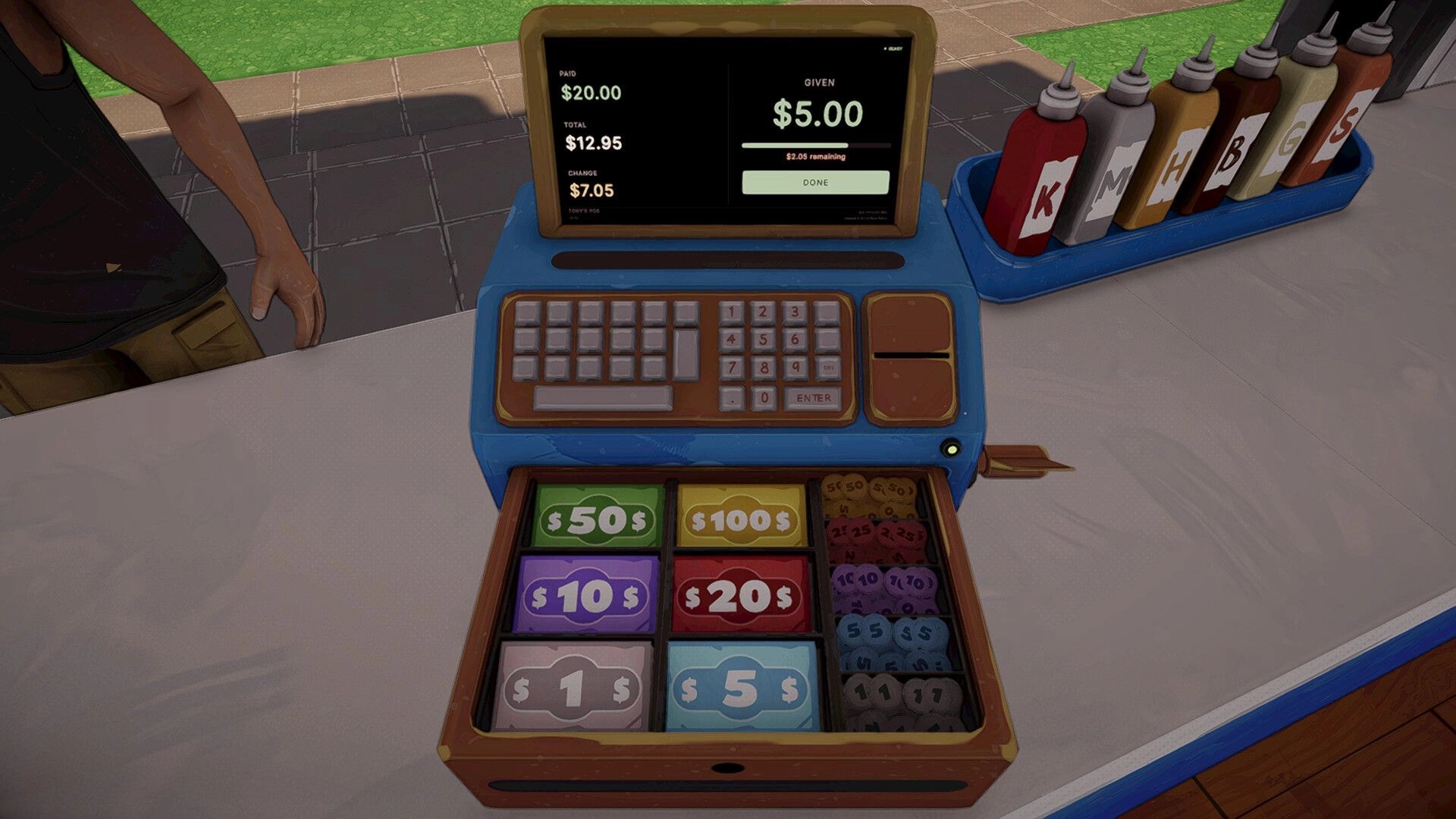 I Know a Guy: Cash register payment screen with open till and condiment bottles on the counter.