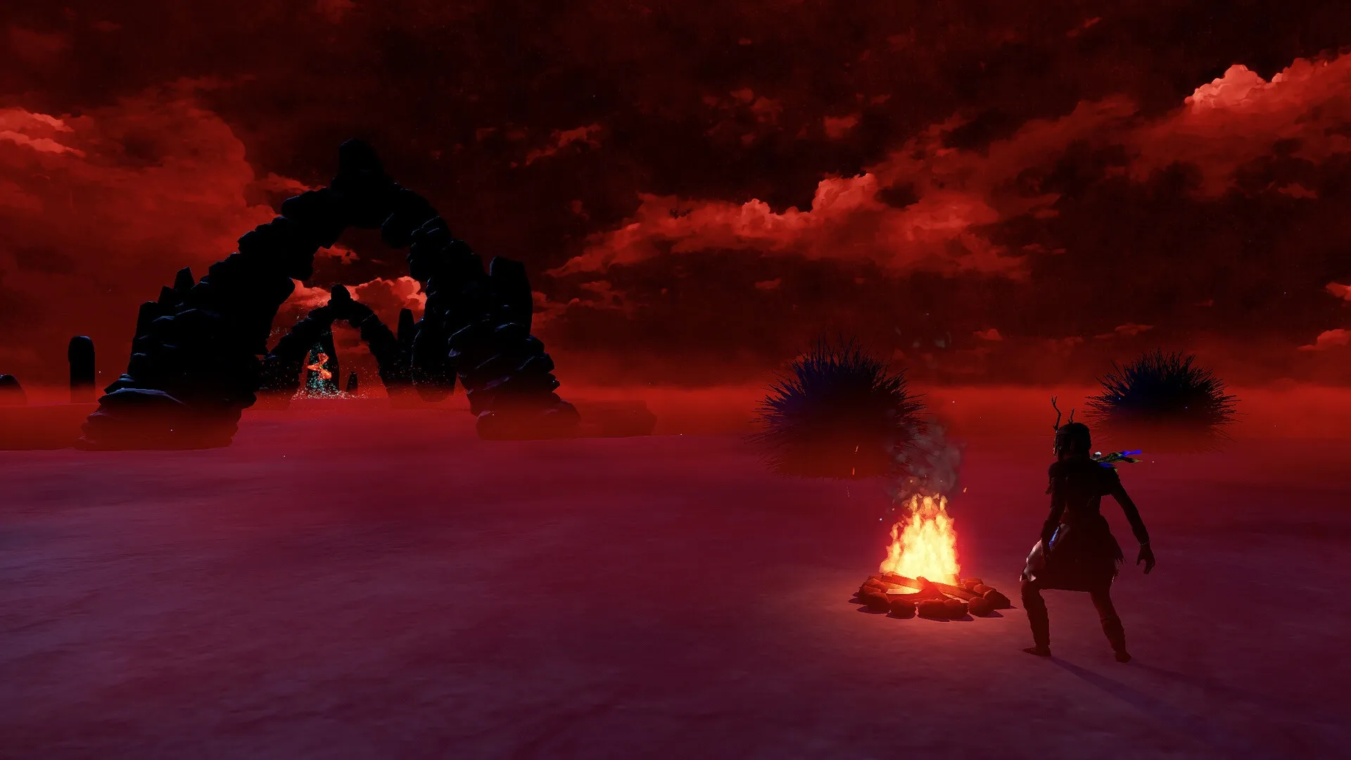 I Mother: Solitary woman stands by campfire under red sky, with archway and shadows in the distance.