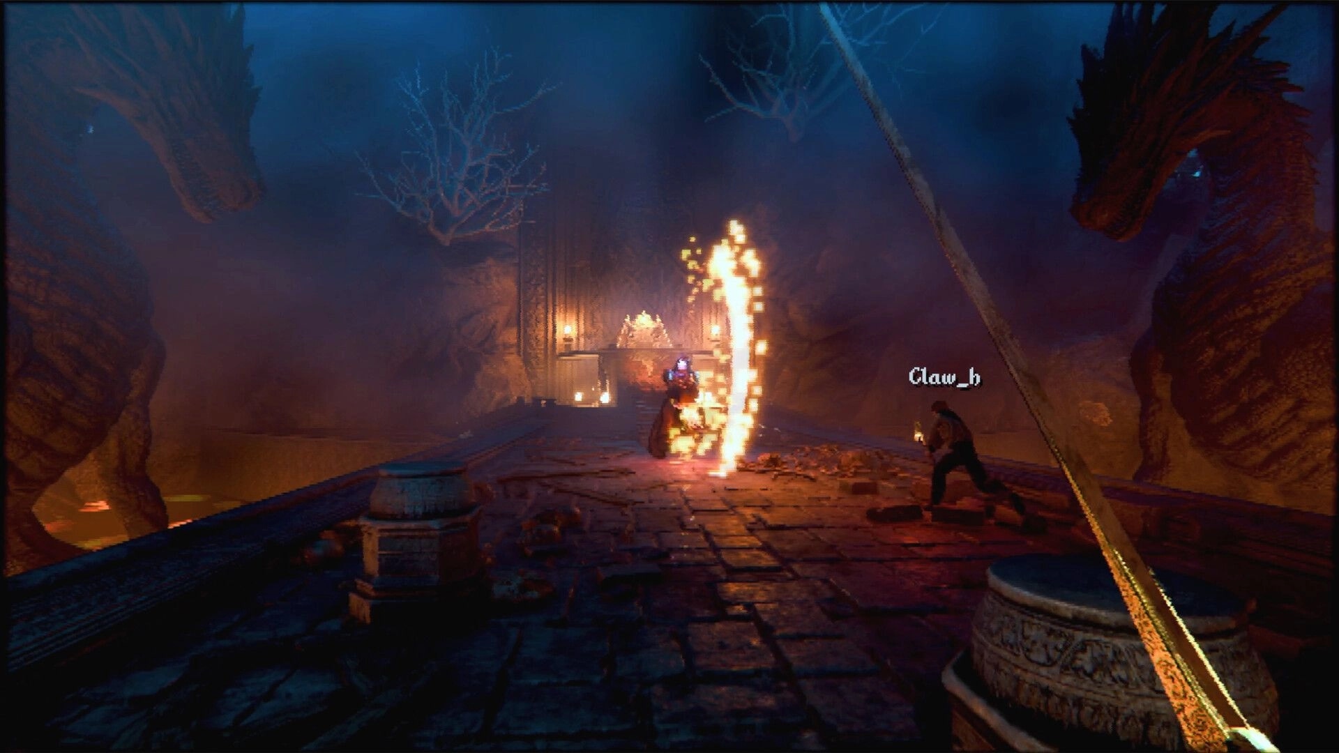 Ignite the Depths: Co-op fight on stone bridge, fire spell flares as two dragons loom in cavern.