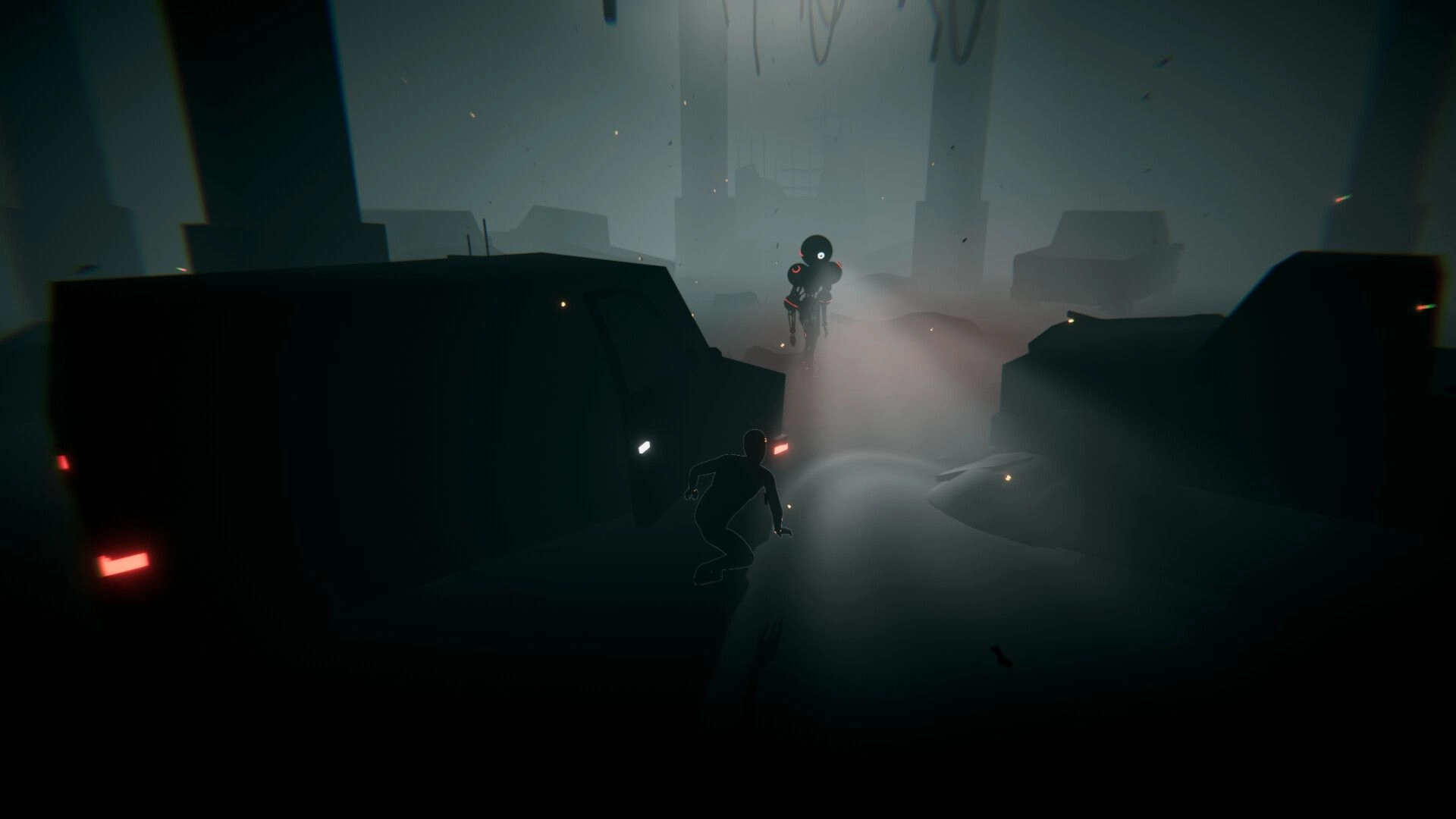 IN SILICO: Player silhouette sneaks between dark trucks toward a hovering drone in a foggy yard.