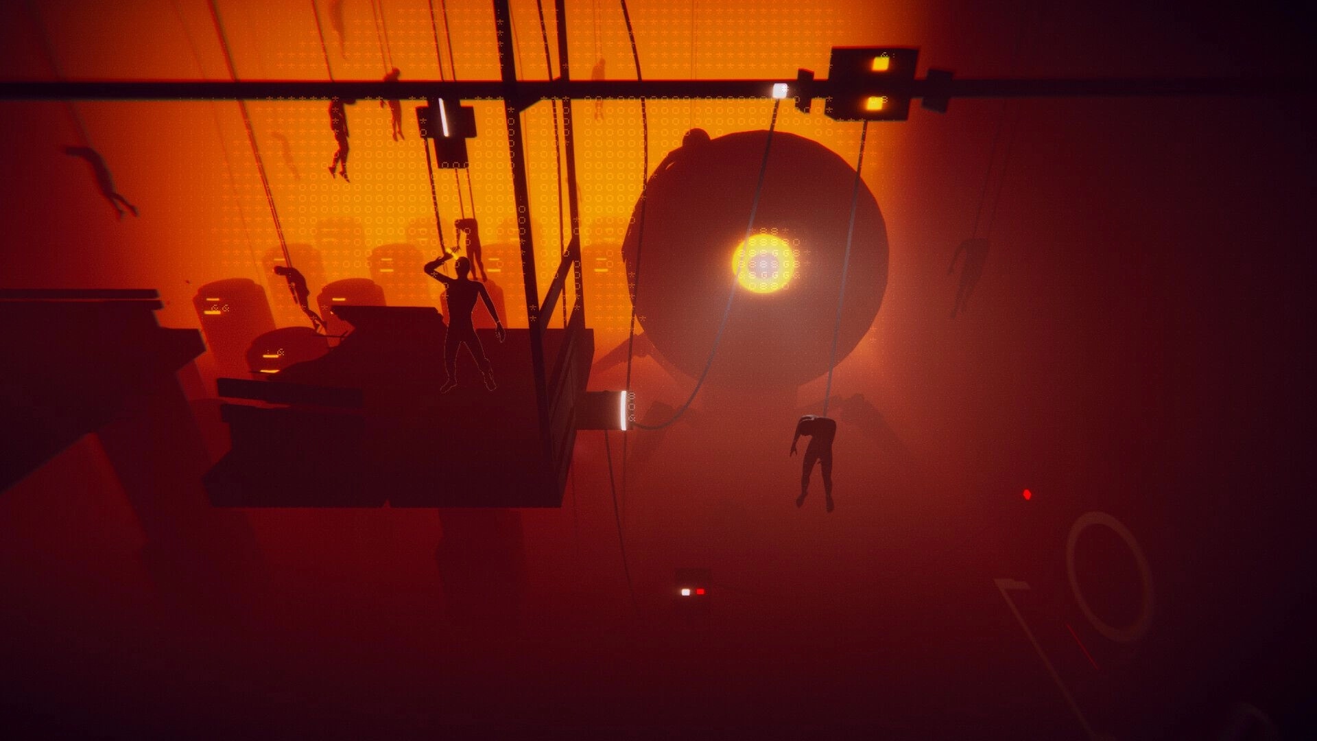 IN SILICO: Silhouetted figures hang by cables near a glowing sphere in a red industrial chamber.