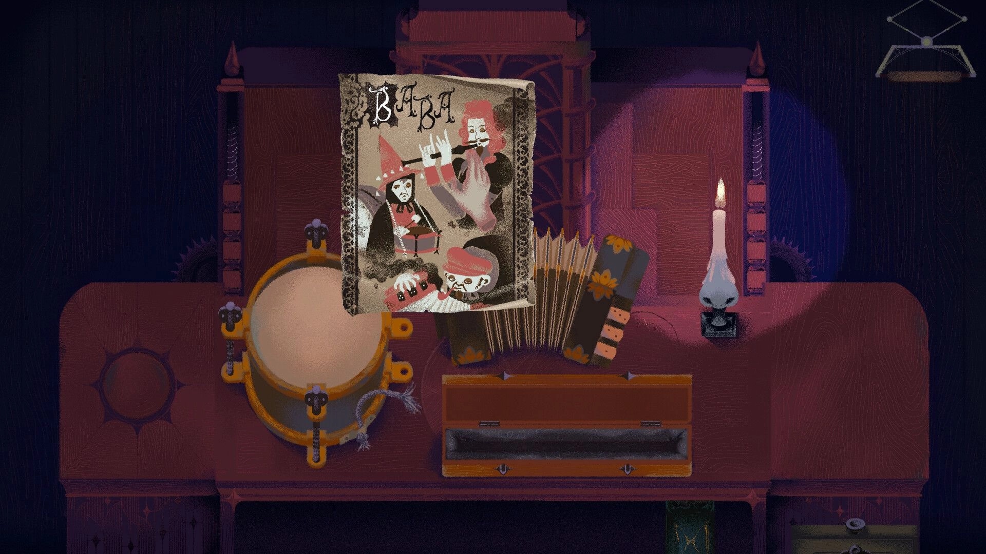 Inkblood: Close-up of a book and instruments on a velvet sofa beside a lit candle in dim room.