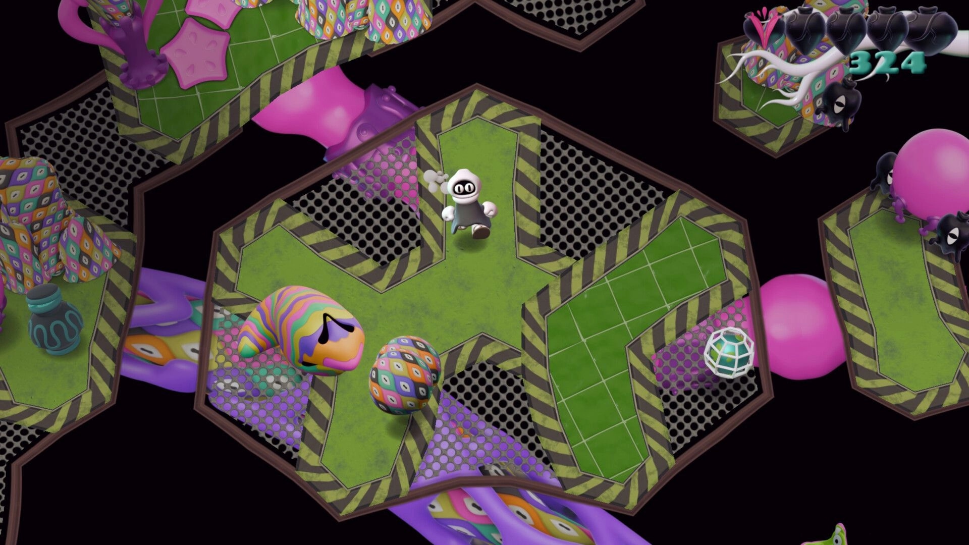 Innards: White-hooded character runs across green platforms, hearts and score UI in void maze.
