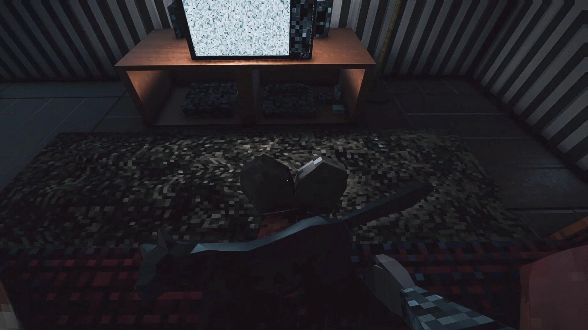 Intown Nightmares: Character watching static-filled TV in dimly lit room with striped walls