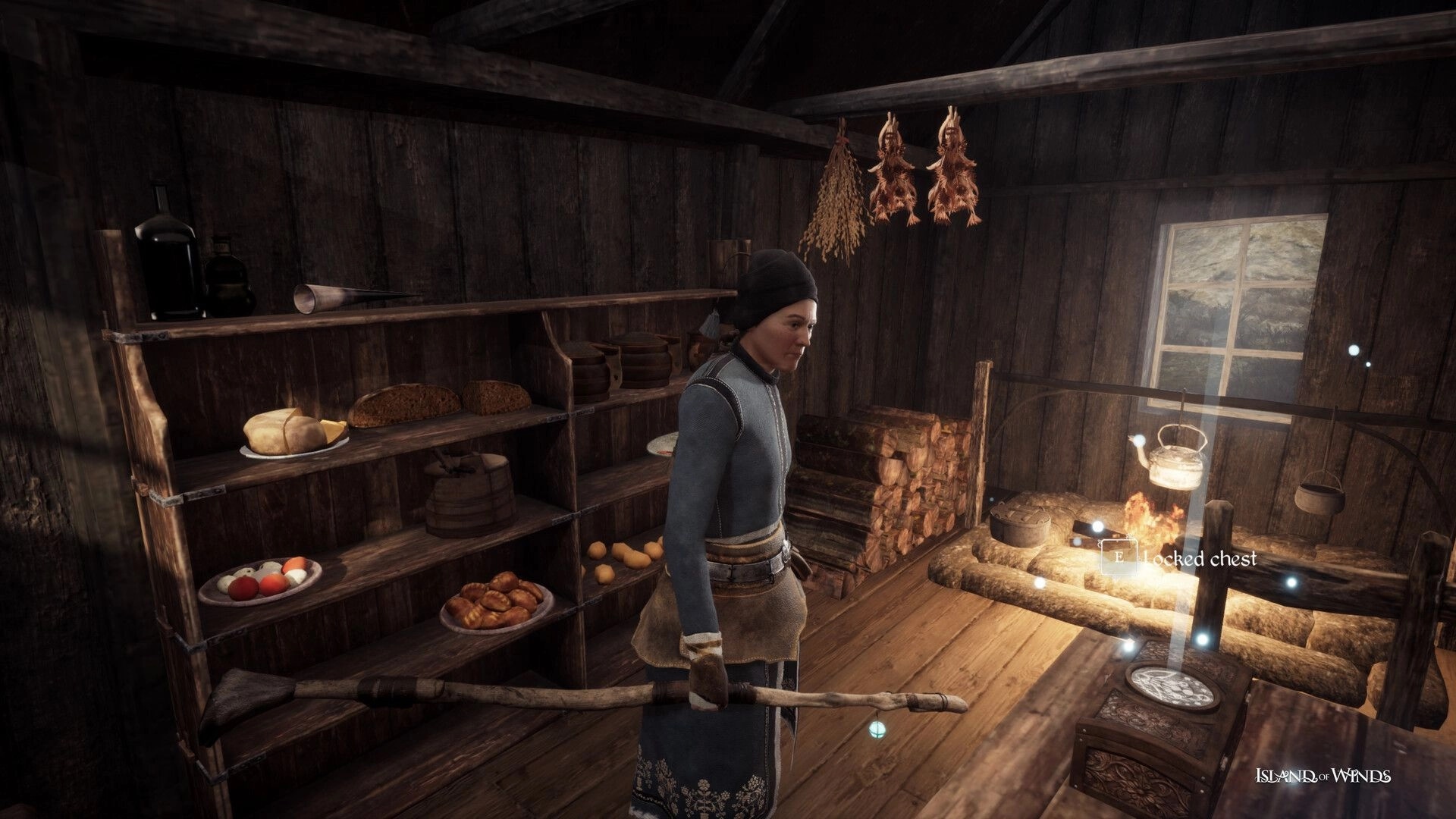 Island of Winds: Brynhildur in rustic cabin with shelves of food, holding a staff near locked chest.