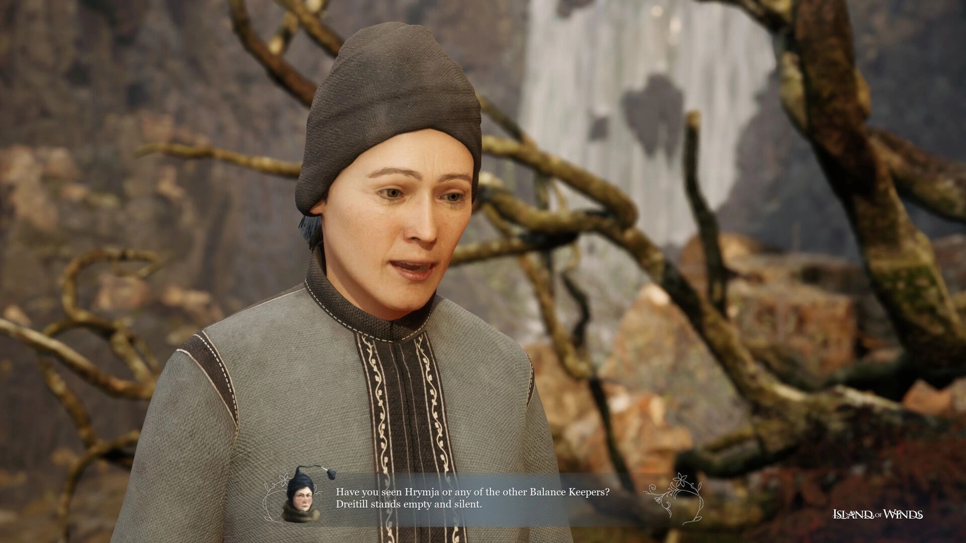 Island of Winds: Brynhildur engages in dialogue amidst a rugged, tree-filled landscape with a waterfall.
