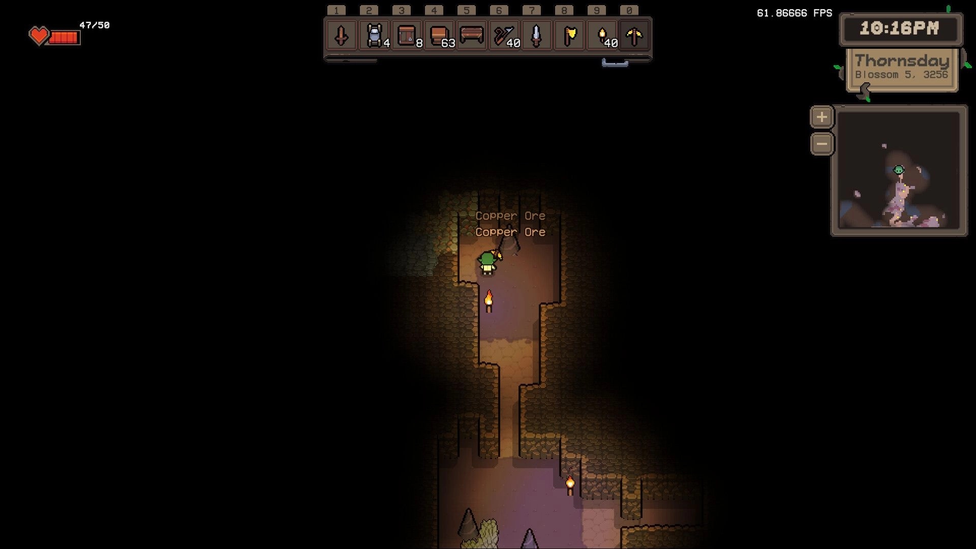 Isle Goblin: Goblin mining copper ore in a dim cave with inventory and map interface visible on screen