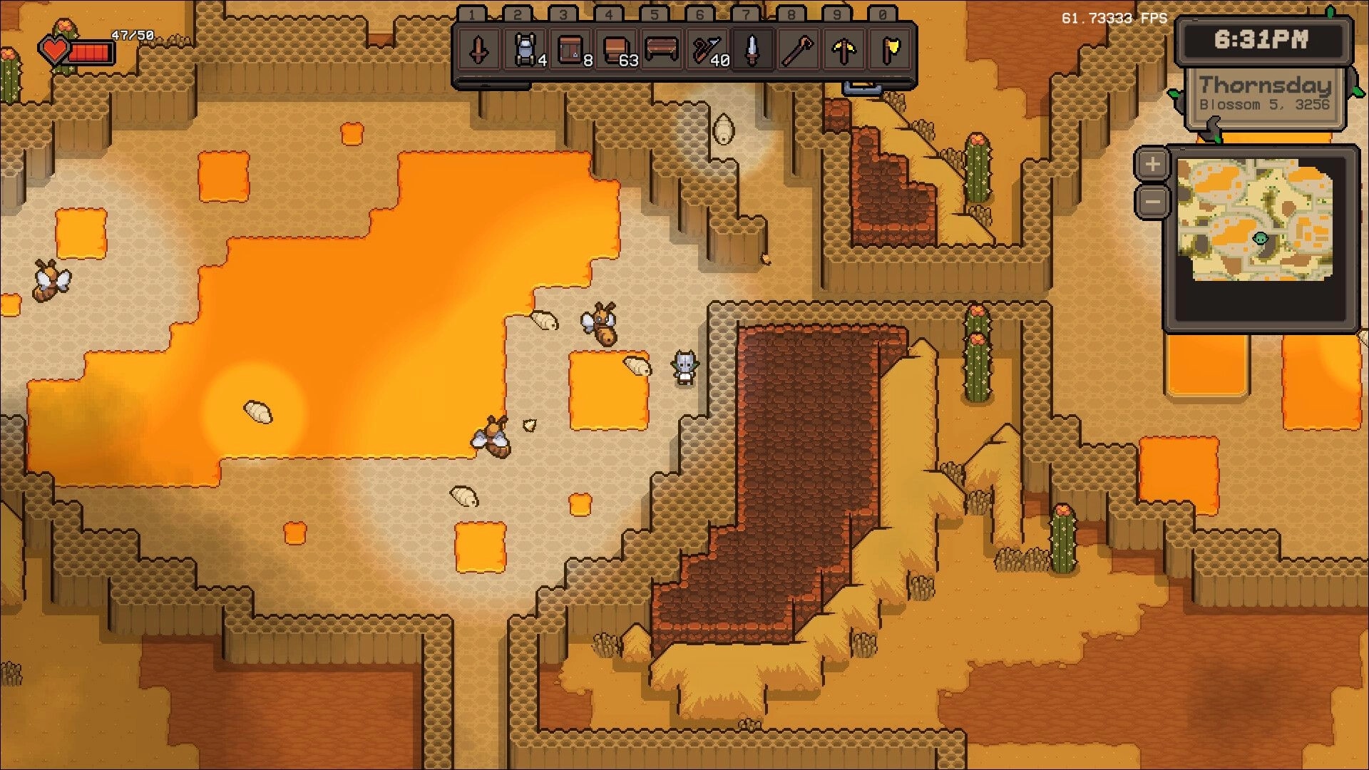 Isle Goblin: Character explores desert terrain with lava pools, inventory toolbar, and mini-map displayed