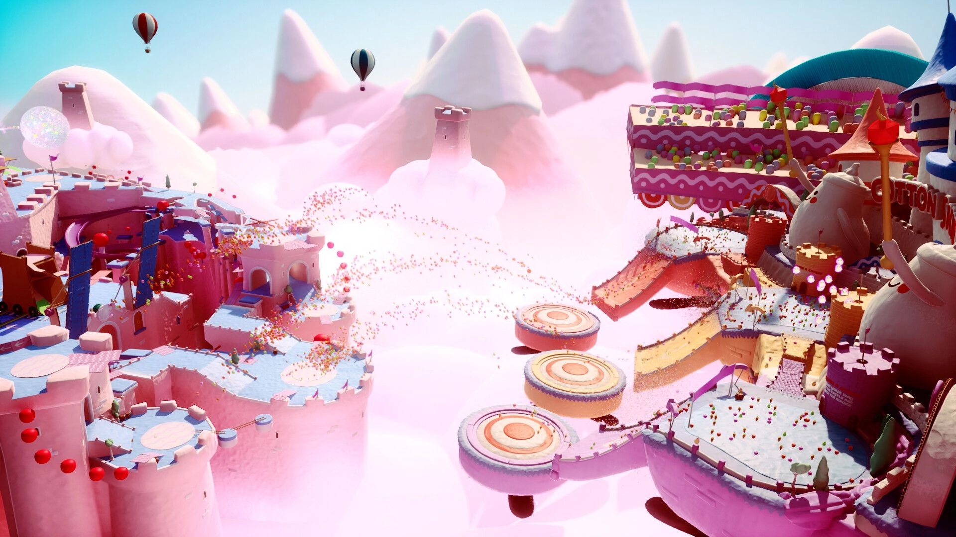 Jitter Games: Colorful candy-themed landscape with castles and floating hot air balloons in the sky