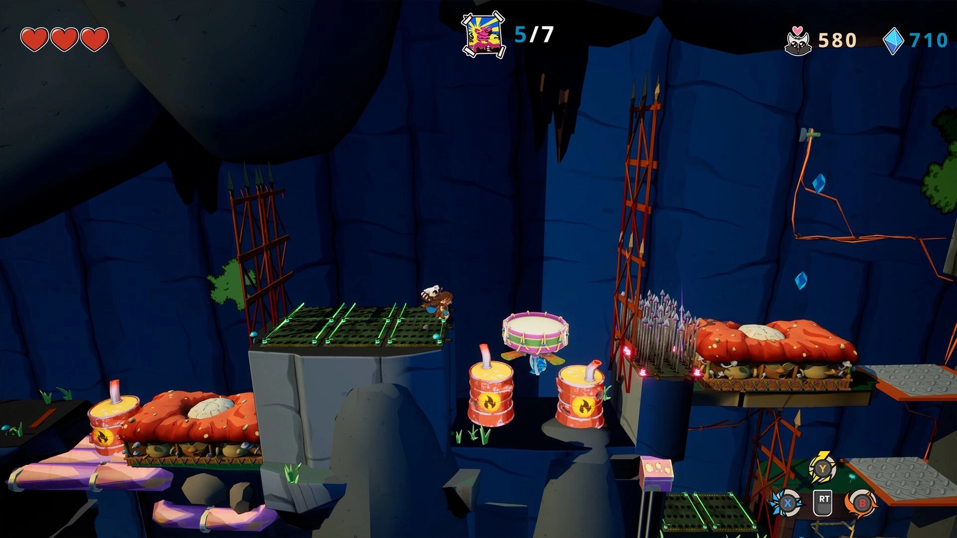 Kalanoro: Platforming across cliff ledges and traps in a cave, with hearts, gems, and score UI.
