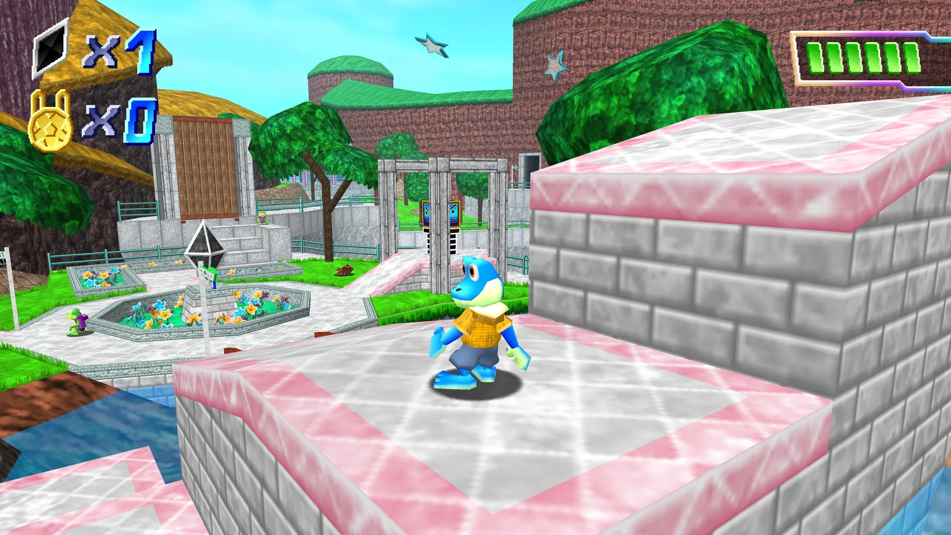 Kero Quest 64: Kero stands on pink-tiled platform overlooking courtyard with flowers and trees
