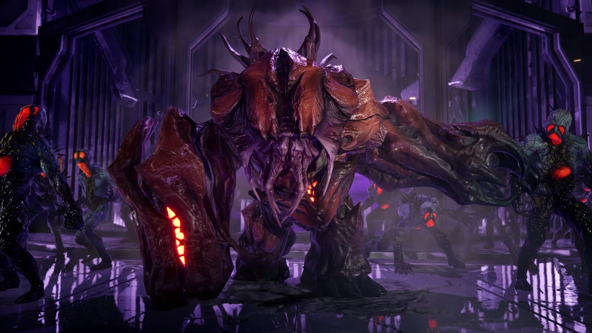Killing Floor 3: Massive bioengineered monster zeds in a dark industrial facility with glowing red lights