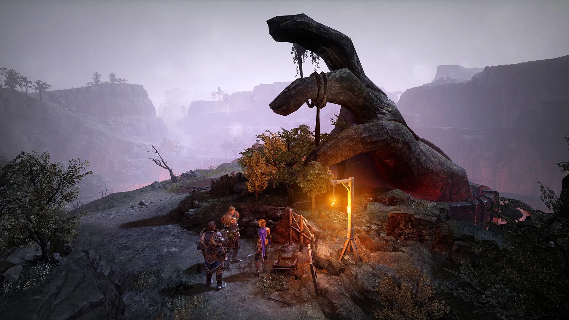 King Arthur: Group of heroes gathered near giant stone hand in misty canyon environment