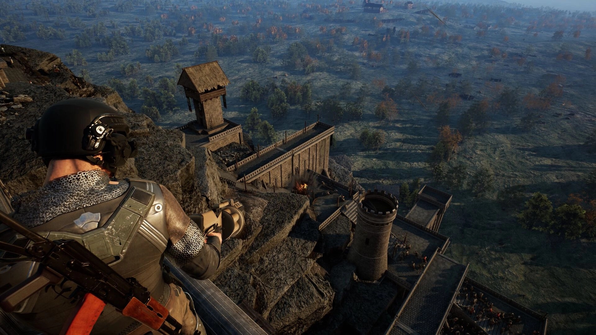 Kingmakers: Armored soldier aims a modern rifle from cliff above a medieval castle and vast battlefield.