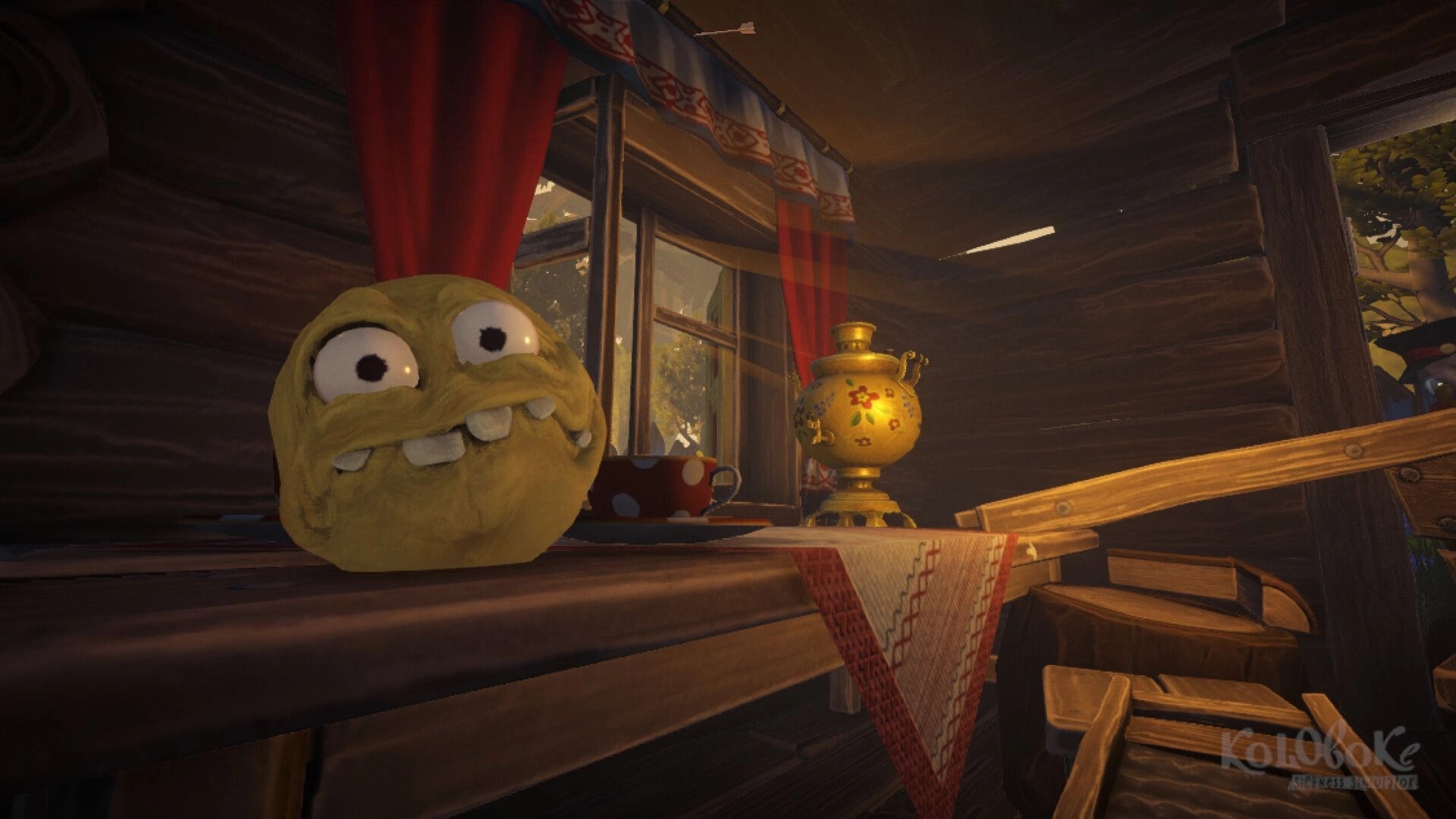 Koloboke: Grinning yellow character on wooden table with samovar and teacup in cozy cabin setting