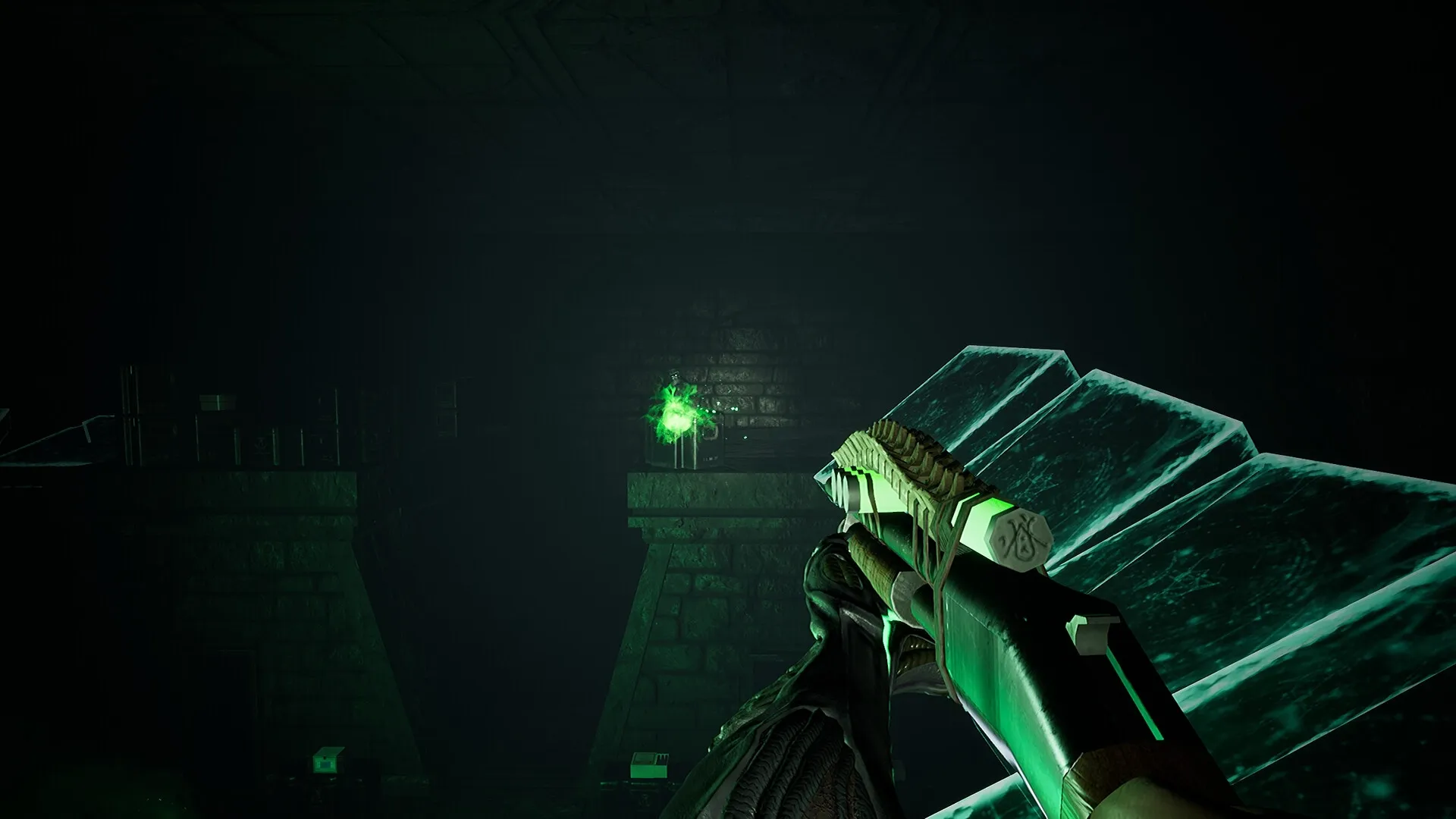 KVLT: First-person view aiming a glowing green energy gun in a dimly lit stone chamber