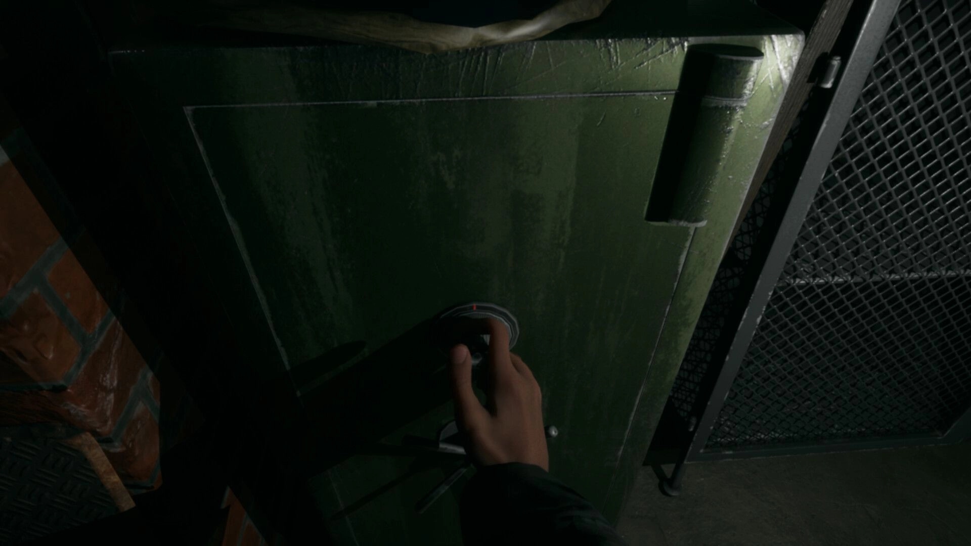 LAG KILLS: First-person hand turns a valve on green metal tank in a dark utility room by mesh gate.