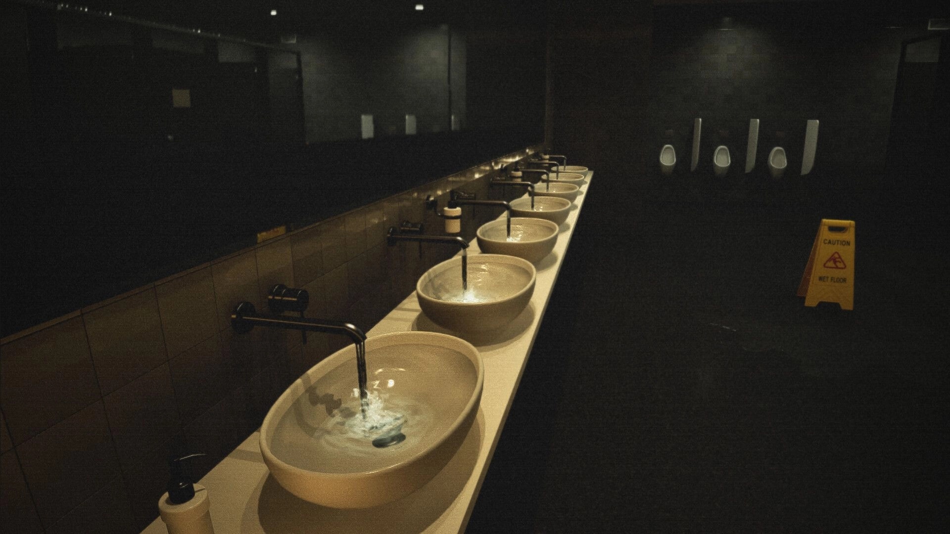 Late Shift: Row of sinks with running water and urinals in a dim cinema restroom, wet floor sign.